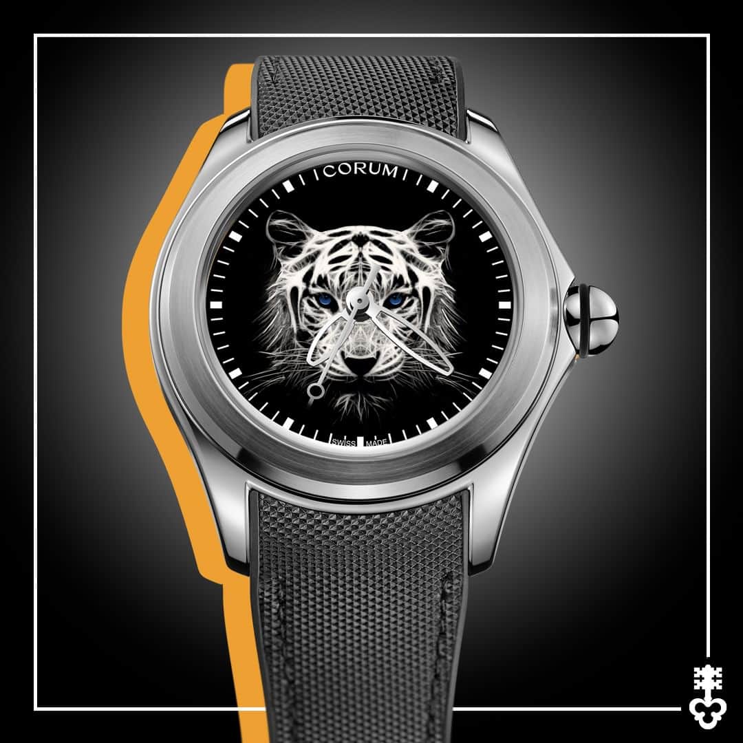 コルムのインスタグラム：「The latest Bubble watch is a nod to the Year of the Tiger.  Corum elevates the tiger, a symbol of power, with a luminescent version on the watch dial that starts to glow when in the dark. Take a closer look, and you will see its eyes shine with ambition and determination, r(o)aring to go!  Limited edition of 222 pieces.  (Ref. L082/04378)  #Corum #CorumWatches #CorumBubble」