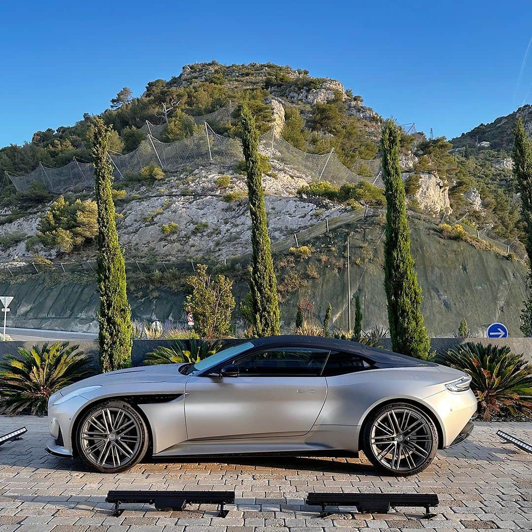 Design Milkさんのインスタグラム写真 - (Design MilkInstagram)「Buckle up for the ride of a lifetime! 🚙💨⚡️ The @astonmartin DB12 beautifully redefines luxury + performance in one sleek package. With a new 671 horsepower twin-turbocharged V-8 engine, this super tourer bursts from 0 to 60mph in just 3.6 seconds, leaving us breathless on the legendary Route Napoléon. A glorious head-turner with a lustrous hue of Iridescent Emerald, the DB12's thoughtful layout + cutting-edge technology elevated our driving experience to a whole new level. 🙌🏼💚 \\\ Learn more + check out our experience at the link in bio. 🔗  💚 Tag a car-crazed friend who needs to check out this beauty!  [Aston Martin, automobile, automotive design, car design, cars, car, dream car]」7月18日 22時13分 - designmilk