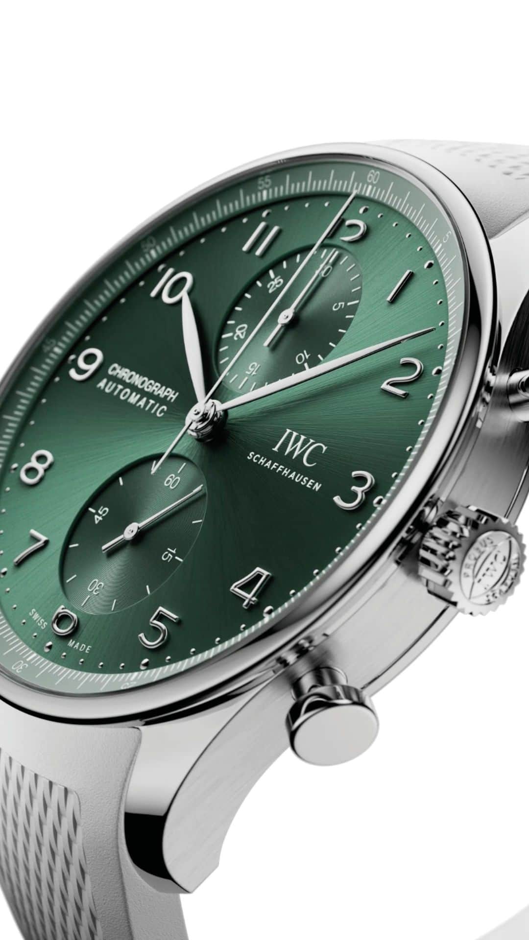 IWCのインスタグラム：「As crisp as it is timelessly modern.  #IWCportugieser | #TheReference  🔗Link in Bio  ℹ Green dial Stainless steel case 41mm IWC-manufactured 69355 Calibre. The robust and precise chronograph movement in classic column-wheel design is visible through a sapphire-glass case back.  Ref. IW371615 - combined with a textured white rubber strap  📍 Visit your IWC boutique or retailer to discover the variety of strap options available.」