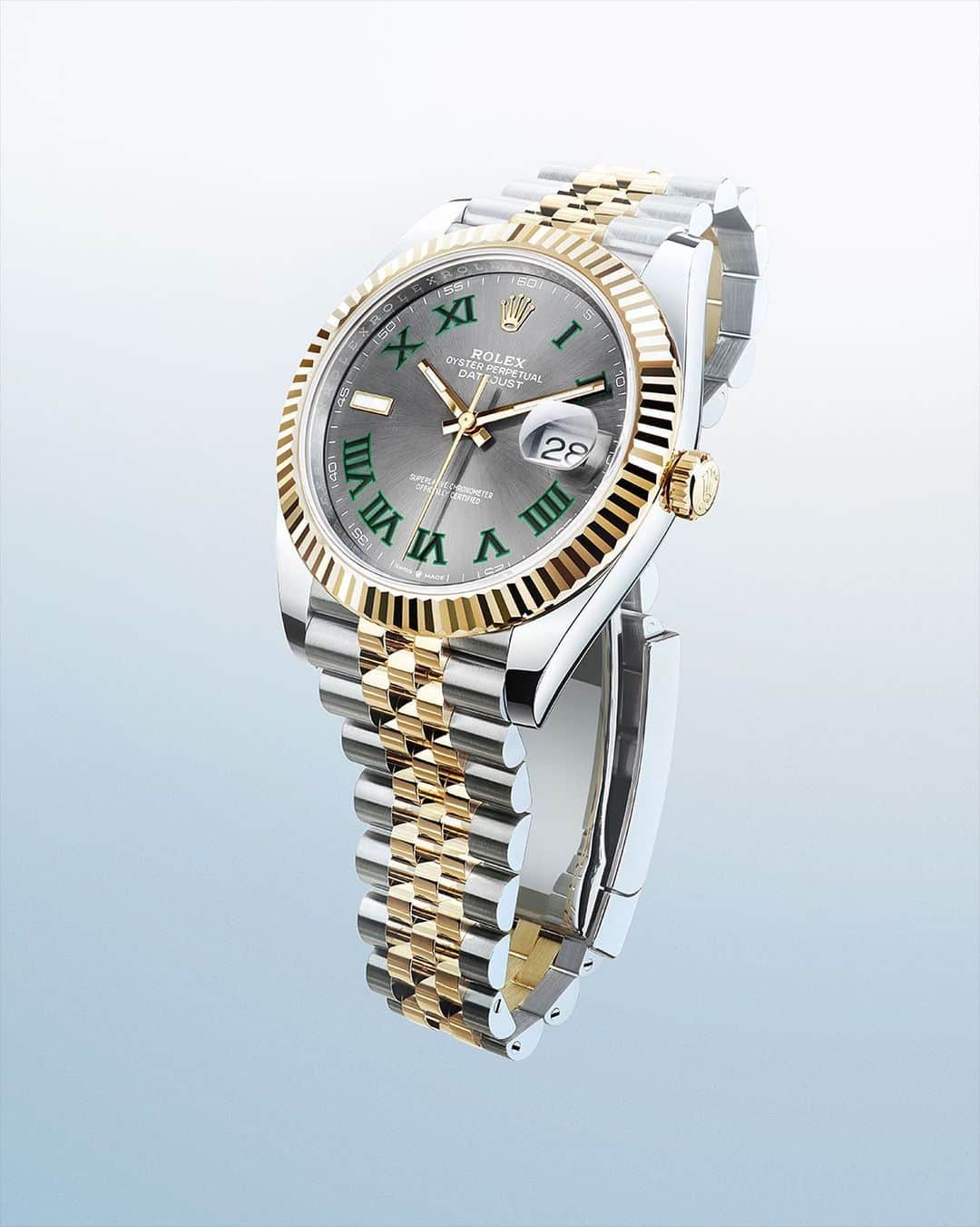 のインスタグラム：「This elegant Datejust 41 in yellow gold and Oystersteel, featuring a slate dial with Roman numerals, has a power reserve of almost three days. Autonomy guaranteed. #Rolex #Datejust #101031」