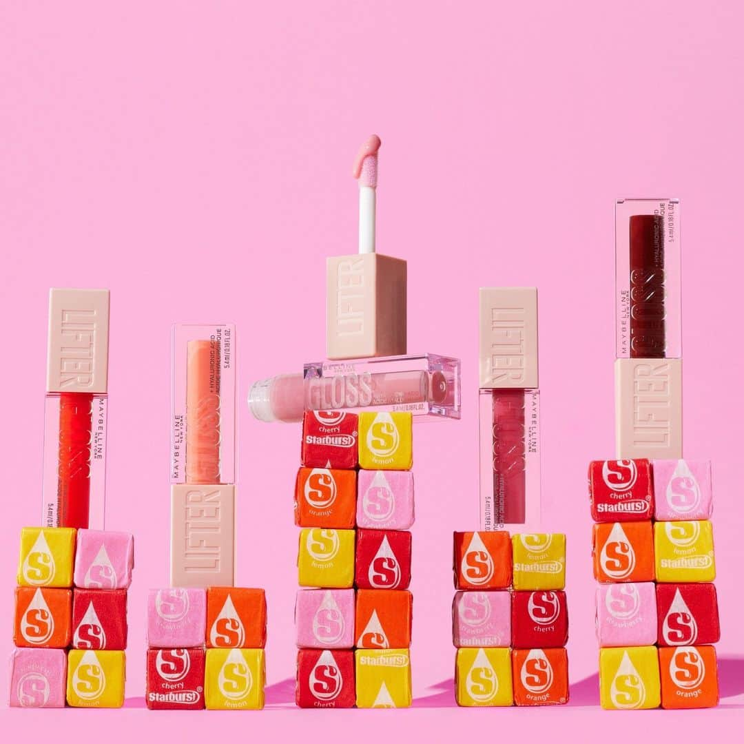 Maybelline New Yorkのインスタグラム：「Swipe of shine, burst of flavor. Pair new Lifter Gloss candy drop shades with @Starburst for a juicy experience. 🌈✨ Shop our gloss collection @targetstyle for 5 candy-inspired shades. From ‘sweetheart’ to ‘bubblegum’, we've got your lips covered in the yummiest way possible! 😋🍭 Snag this candylicious now!」