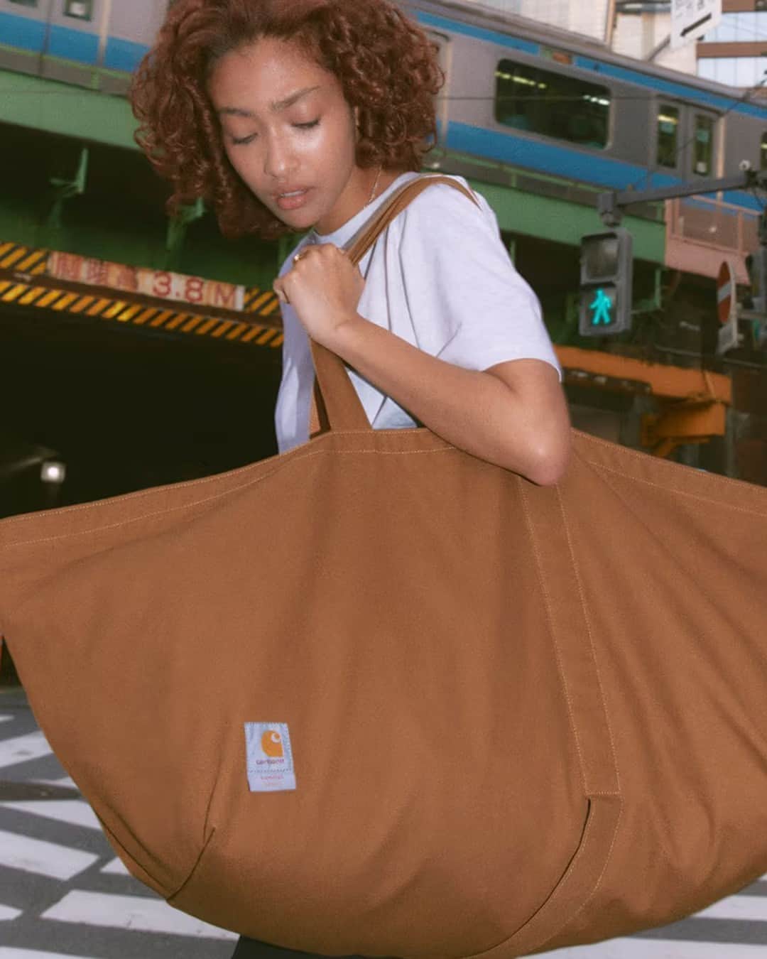 HYPEBEASTさんのインスタグラム写真 - (HYPEBEASTInstagram)「@hypebeaststyle: Pack all your goodies with the @ramidustokyo x @carharttwip bag capsule.⁠ ⁠ The collection of bags is perfect for skateboarders and music enthusiasts, with nine new bags being designed to provide the perfect companion for those on the move, whether on the board or for transporting CDs and vinyl. ⁠ ⁠ Bags arrive in various sizes from the XL Tote Bag, Shoulder Bag, Box Day Pack, Tote Bag L, Newspaper Bag, Band Wallet, Pouch, Vinyl Case, and Fanny Pack. Each bag has been crafted with various pockets, with neutral color palettes being utilized that lean into Carhartt’s classic “Hamilton Brown” and “Stark White” showcasing the iconic Detroit workwear brand woven label with a collaborative logo lock up.⁠ The collection arrives on July 20.⁠ Photo: Carhart WIP/Ramidus⁠ ⁠」7月20日 5時10分 - hypebeast