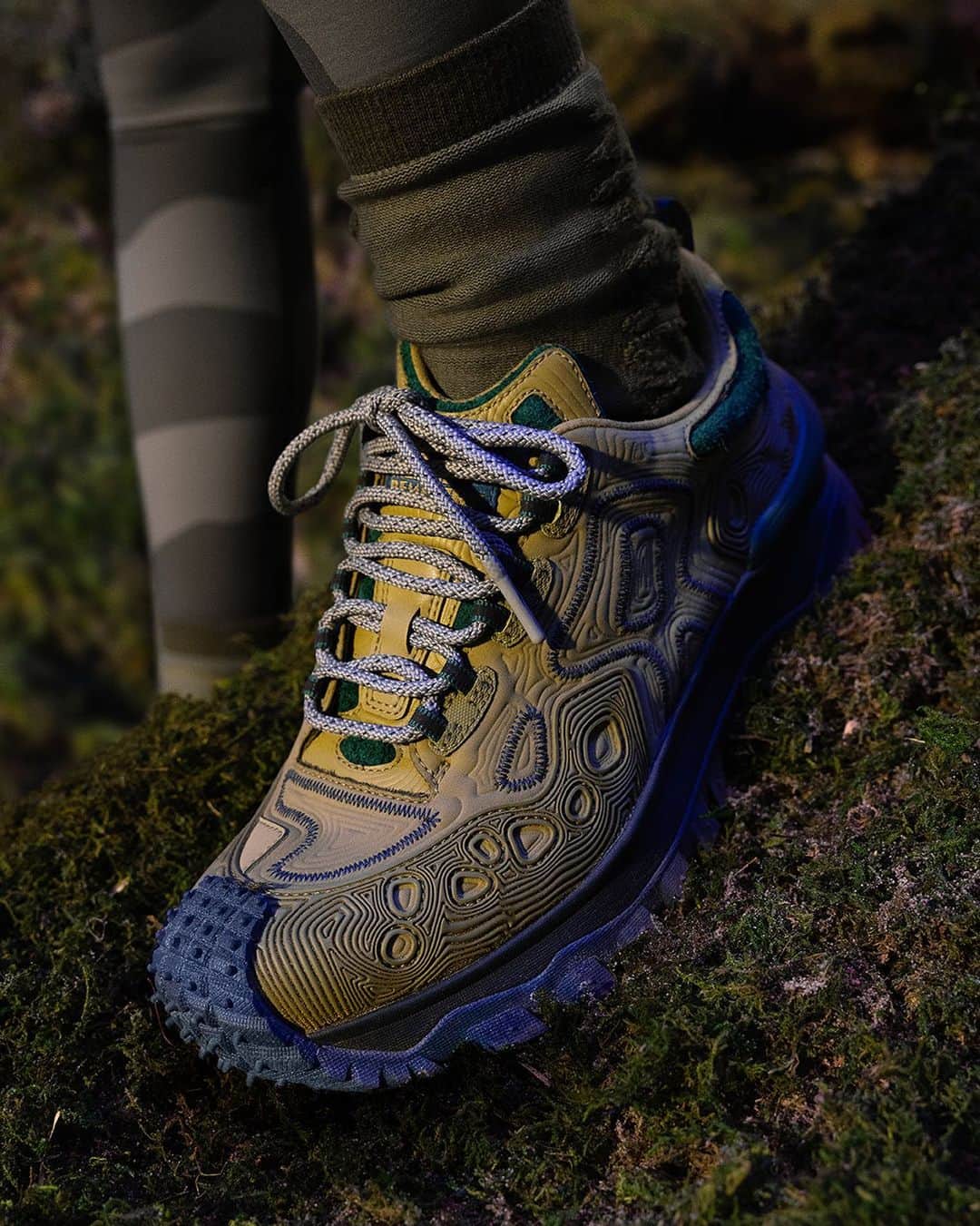 モンクレールのインスタグラム：「The Trailgrip 'Grain' by Salehe Bembury. Moncler’s signature sneaker redesigned with Salehe’s genre-defining perspective on footwear.  Molded with Salehe’s signature ‘grain’ thumbprint, the Moncler Trailgrip design resonates on a new frequency in organic green, orange and pastel taupe hues.  Shop Moncler x Salehe Bembury footwear on moncler.com  #MonclerTrailgrip #MONCLERGENIUS #MONCLERSALEHEBEMBURY @salehebembury」