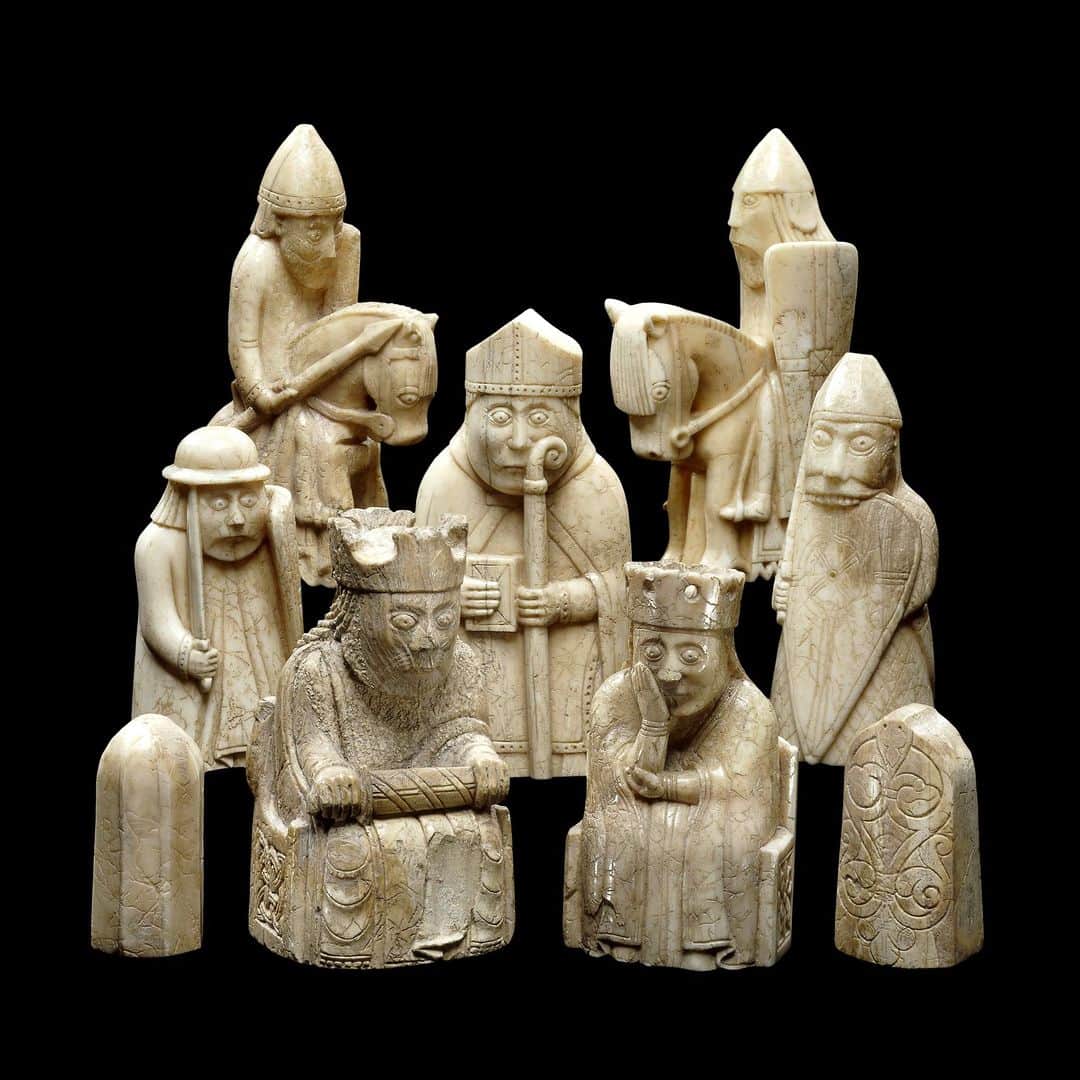 大英博物館のインスタグラム：「We couldn’t let #WorldChessDay pass without sharing the Lewis Chessmen, some of the most iconic gaming pieces in the world ♟  The chess pieces were found on the Isle of Lewis in Scotland in around 1831, but it remains a mystery who they belonged to or how they came to the island.   Think you know the players on the board? Take a guess at which roles these charismatic characters play, and then check your answers below…   ♟ Pawn: The pawns, shaped like small round-topped pillars, sit at either side of the bottom row. One is decorated with a filigree pattern of leaves and vines.   🐴 Knight: No surprises here – the knights are riding horses!   ✝ Bishop: The bishop stands in the middle, holding a crozier and a book.   🏰 Rook: The rooks flank the central figure, their swords drawn. One is depicted as a berserker, biting his shield!  🤴 King: On bottom row in the centre, the king is seated on a throne and holds a sheathed sword.   👸 Queen: The queen sits enthroned beside her husband, resting her chin on her hand.  ♟ Checkmate your mates with a your very own chess set inspired by the Lewis Chessmen – head to britishmuseumshoponline.org to browse the range.  🔎 The Lewis Chessmen. Carved walrus ivory and whales’ teeth, found on the Isle of Lewis, Scotland, 1150–1175.   #BritishMuseum #LewisChessmen #Chess」