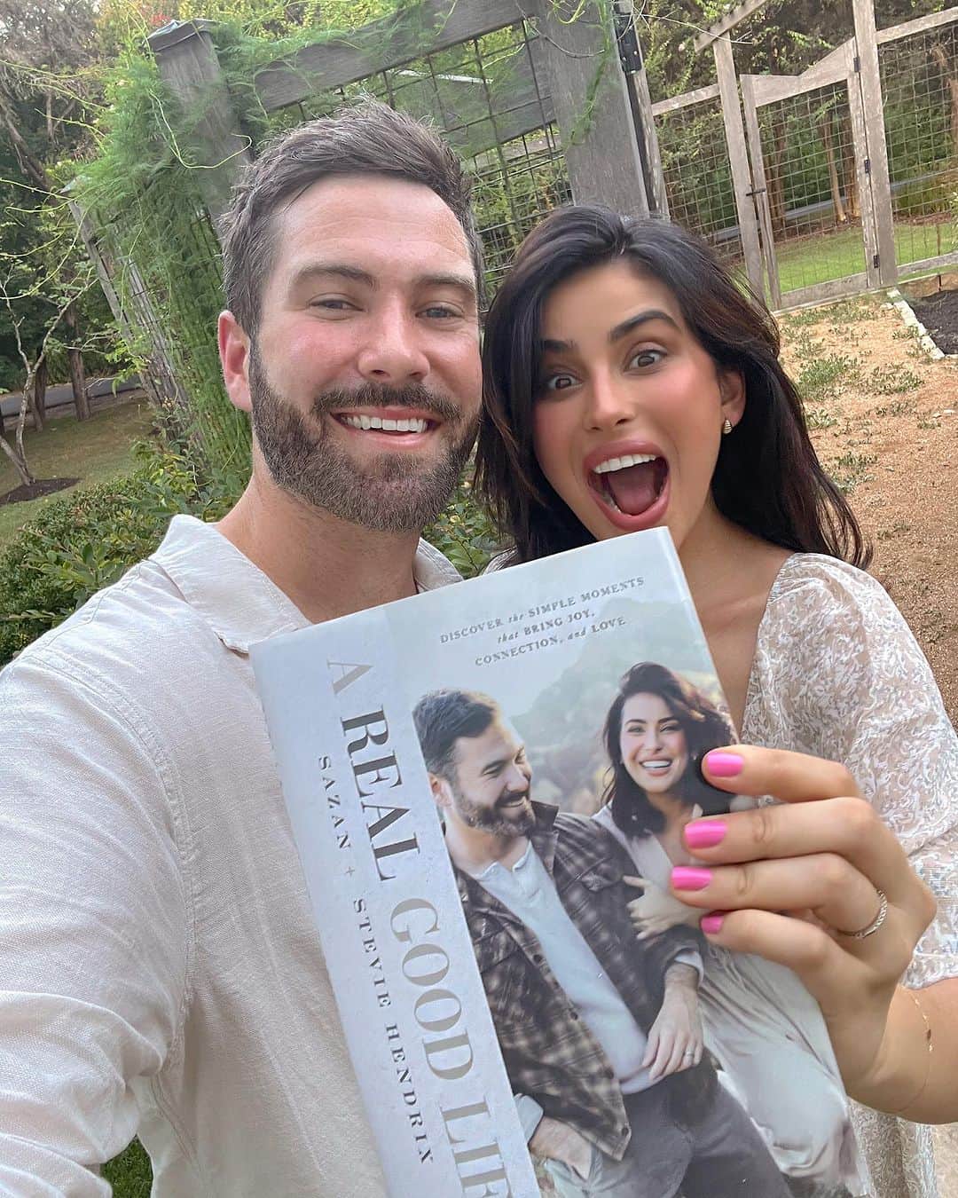 Sazan Hendrixのインスタグラム：「WE WROTE A BOOK!! 📖🙌🏽 Sharing this news with you feels surreal. There's so much we want to tell you!  Let's take a trip back in time, 5 YEARS ago, when the idea of writing a book first took root in our hearts. It was a challenge we wholeheartedly embraced amidst growing our family, moving across the country, and managing three businesses. This book's message was no ordinary task; it required thoughtful intention, and we prayerfully revisited and refined it several times until it felt just right.   Living the good life can be simple. Getting to the place where you believe that and lean into it often isn’t.  “A Real Good Life” is a deeply personal and enlightening book that breaks free from the conventional Western obsession with the self-centered pursuit of “the Good Life.” Instead, it guides you toward a path that leads to genuine, authentic, and lasting happiness. While the title might imply an ideal of perfection and unending happiness, the book dives deep into life’s complexities—the highs and the lows. It emphasizes the importance of recognizing and embracing both hardships and moments of joy. You  will discover that both aspects are equally valuable in shaping a life you can truly love every day, even when you haven’t yet reached your desired destination.  🎉Our debut book, "A Real Good Life," is scheduled for release October 10th! Order your copy at link in bio or comment “good life” and I’ll DM ya!✨ #booklaunch #arealgoodlife」