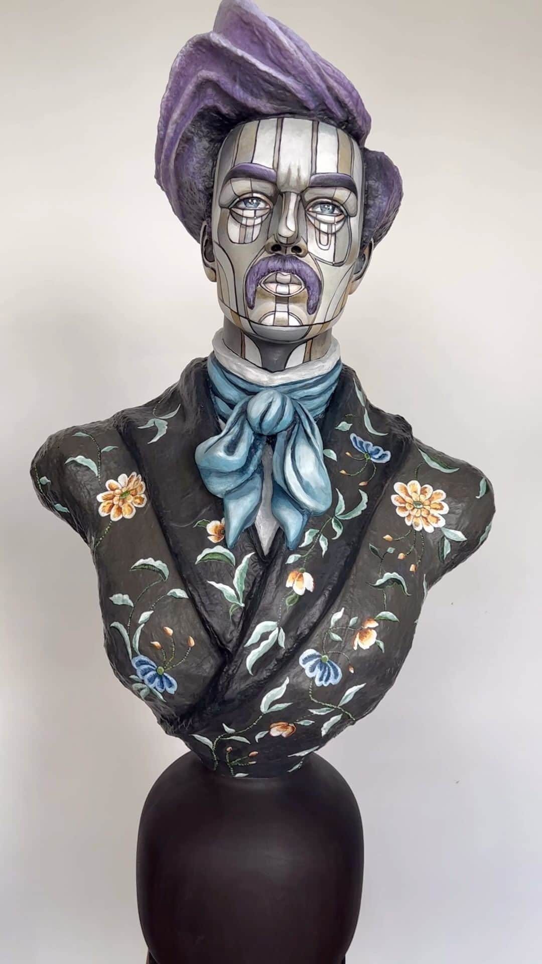 デヴィッド・ギルモアのインスタグラム：「My made over mannequin sculpture got another makeover. I’d posted him last December and he was going by the name Frédérique LaVender. To complete his transformation, this fine fellow got a bigger nose (can you imagine?), a substantial mustache, a flowing powder blue scarf, and a Gucci inspired jacket. He’s still resting on a beautiful custom base created by @jamesenglishstudio  36” in height. He’s now going by the name Freddie Fleur LaVender. Please respect his choices.   Sold. 🔴  #davidgilmorestudio #gucci #alessandromichele #modernart #sculpture #repurposed #makeover #contemporaryart #collage」