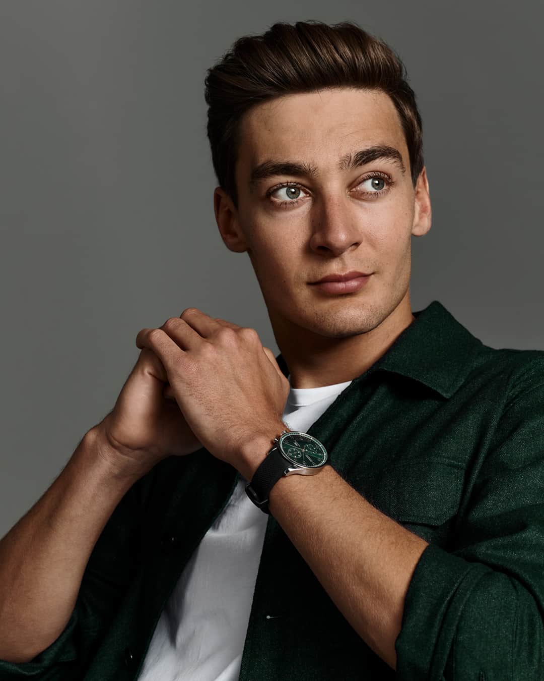 IWCのインスタグラム：「F1 driver and Brand ambassador @georgerussell63 wearing the Portugieser Chronograph (Ref. IW371615) matched with a black textured rubber strap. #IWCportugieser | #TheReference  🔗Link in Bio  Visit your IWC boutique or retailer to discover the variety of strap options available.」