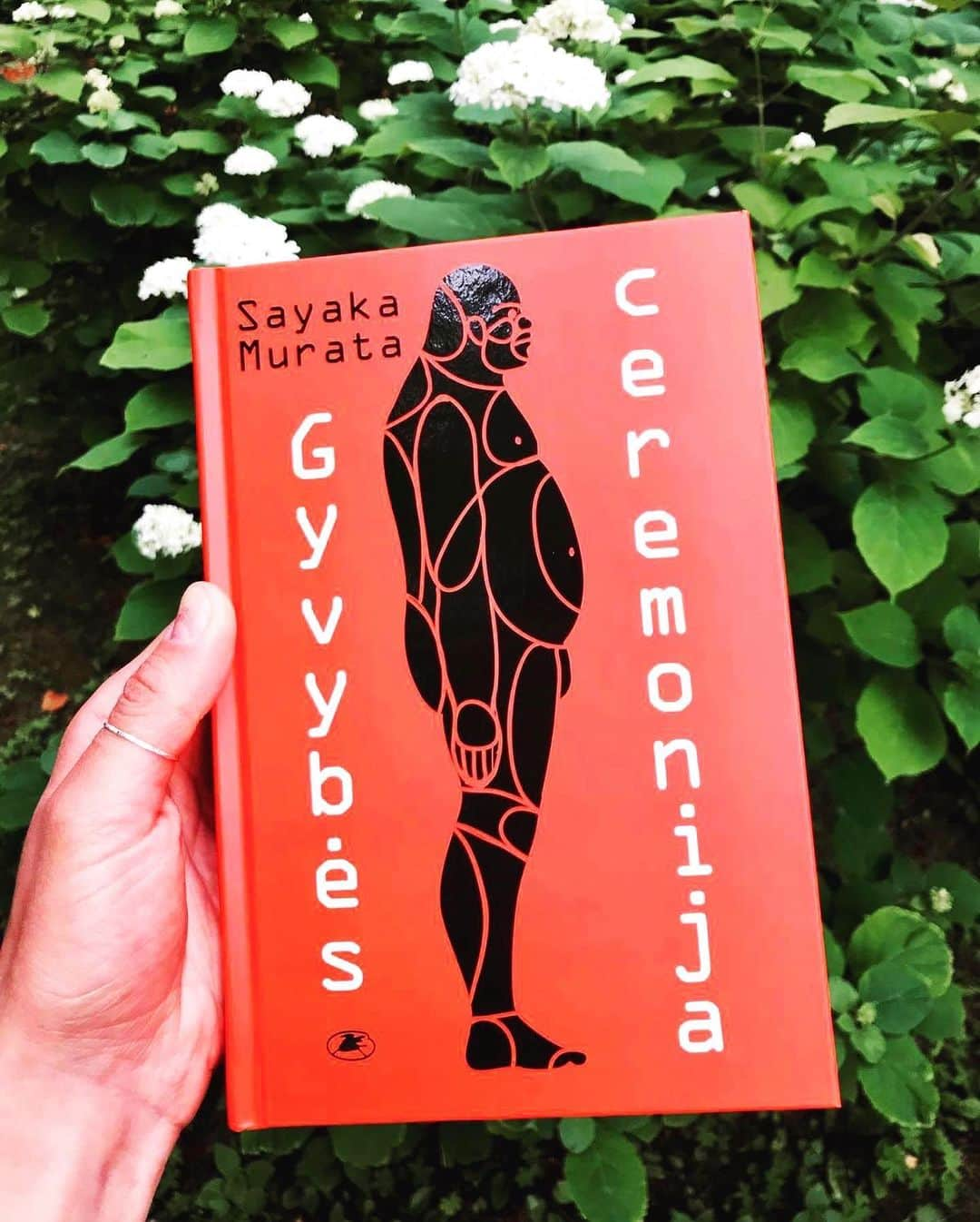 村田沙耶香さんのインスタグラム写真 - (村田沙耶香Instagram)「A Lithuanian version of "LIFE CEREMONY" has been launched in Lithuania. The title in Lithuania is "GYVYBĖS CEREMONIJA". Translator Rūta Aleksandravičiūtė sent me beautiful photos of the book and the beautiful Lithuanian summer greenery.  Thank you so much to the publisher Lithuanian Writers' Union Publishing House, I am thrilled with this beautiful book!!And to the translator Rūta Aleksandravičiūtė, thank you so much.  リトアニアで、リトアニア語版の『生命式』が発売されました。 リトアニアでのタイトルは “GYVYBĖS CEREMONIJA”です。 翻訳家のRūta Aleksandravičiūtėさんから、完成した美しい本と、リトアニアの綺麗な夏の緑の写真を送って頂きました。 出版社のLithuanian Writers’ Union Publishing Houseさん、美しい本にとても感激しています、本当にありがとうございます。 そして翻訳家のRūta Aleksandravičiūtėさん、素晴らしいお仕事をしてくださって本当にありがとうございます。」7月21日 23時57分 - sayaka_murata_