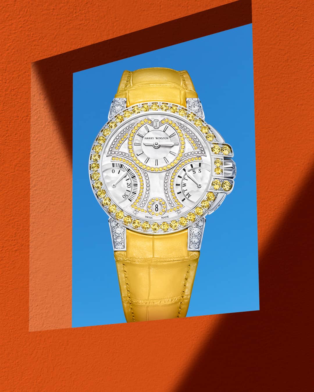 ハリー・ウィンストンのインスタグラム：「A yellow pearl alligator leather bracelet and yellow sapphire–accented dial make for an eye-catching, sunshine-toned statement. Adorn yourself in summertime colors with the Ocean Biretrograde Yellow Automatic 36mm timepiece—link in bio. #HarryWinston #WinstonHighJewelry」