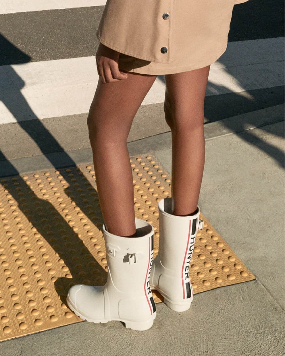 ハンターブーツのインスタグラム：「Complete your look in our Backstrap Wellington Boots. A graphic spin on our iconic silhouette, lined with recycled polyester and crafted from FSC®-certified natural rubber.」