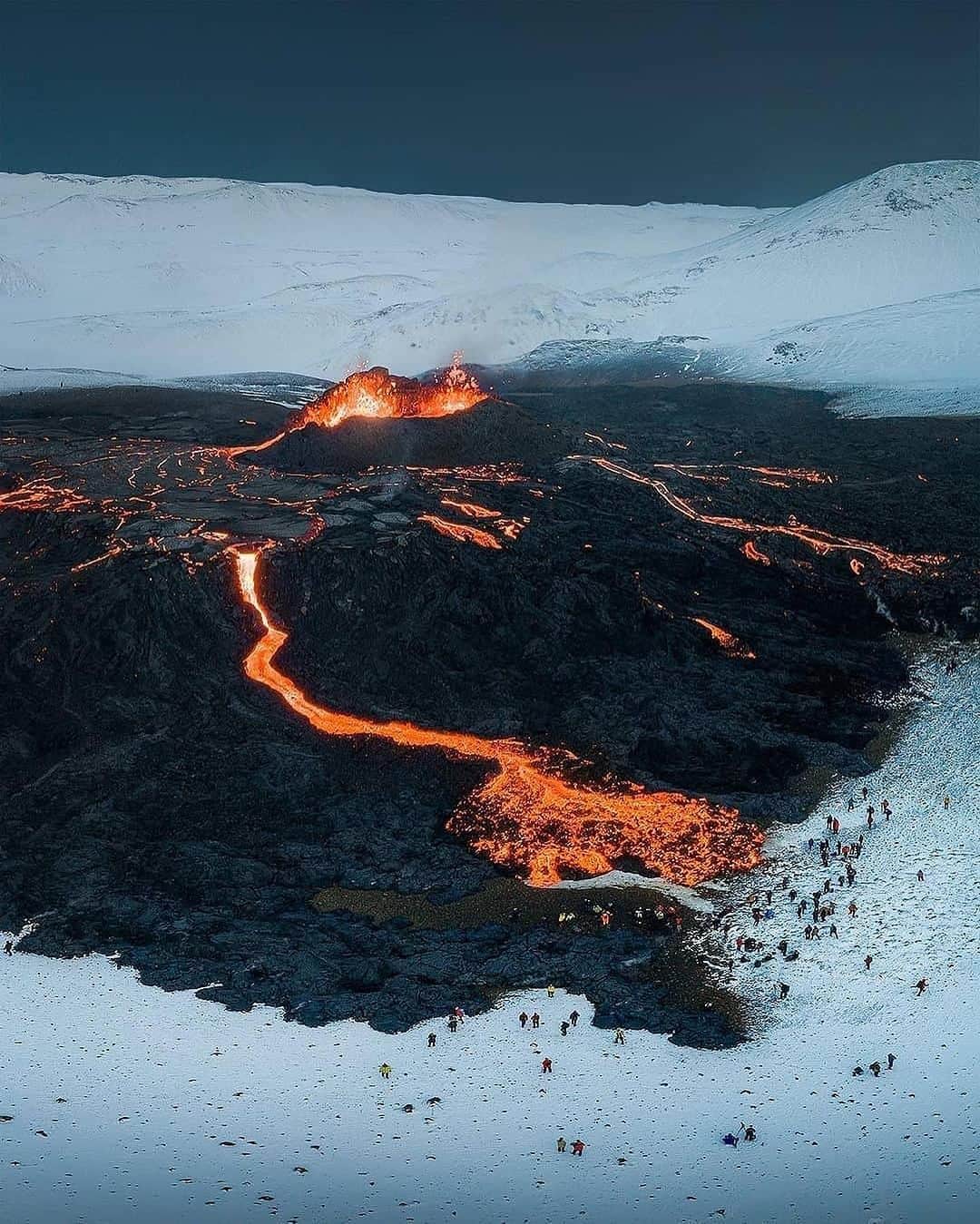 Earth Picsさんのインスタグラム写真 - (Earth PicsInstagram)「@arnarkristjans_photography — In 2021, a mesmerizing volcanic eruption near Reykjavik captured the attention of spectators for a remarkable six-month period, making it the longest eruption witnessed in Iceland in over 50 years.  The eruption commenced on the evening of March 19 in the vicinity of Mount Fagradalsfjall, situated on the Reykjanes peninsula southwest of Reykjavik. Throughout this incredible event, observers witnessed a range of breathtaking phenomena, from a gentle flow of lava to dramatic eruptions resembling geysers, spewing rocks and stones into the air.  This extraordinary natural spectacle quickly became a major tourist attraction, attracting a staggering 300,000 visitors, as reported by the Iceland Tourist Board.  📸 @arnarkristjans_photography  📍Iceland 🇮🇸」6月29日 23時26分 - earthpix