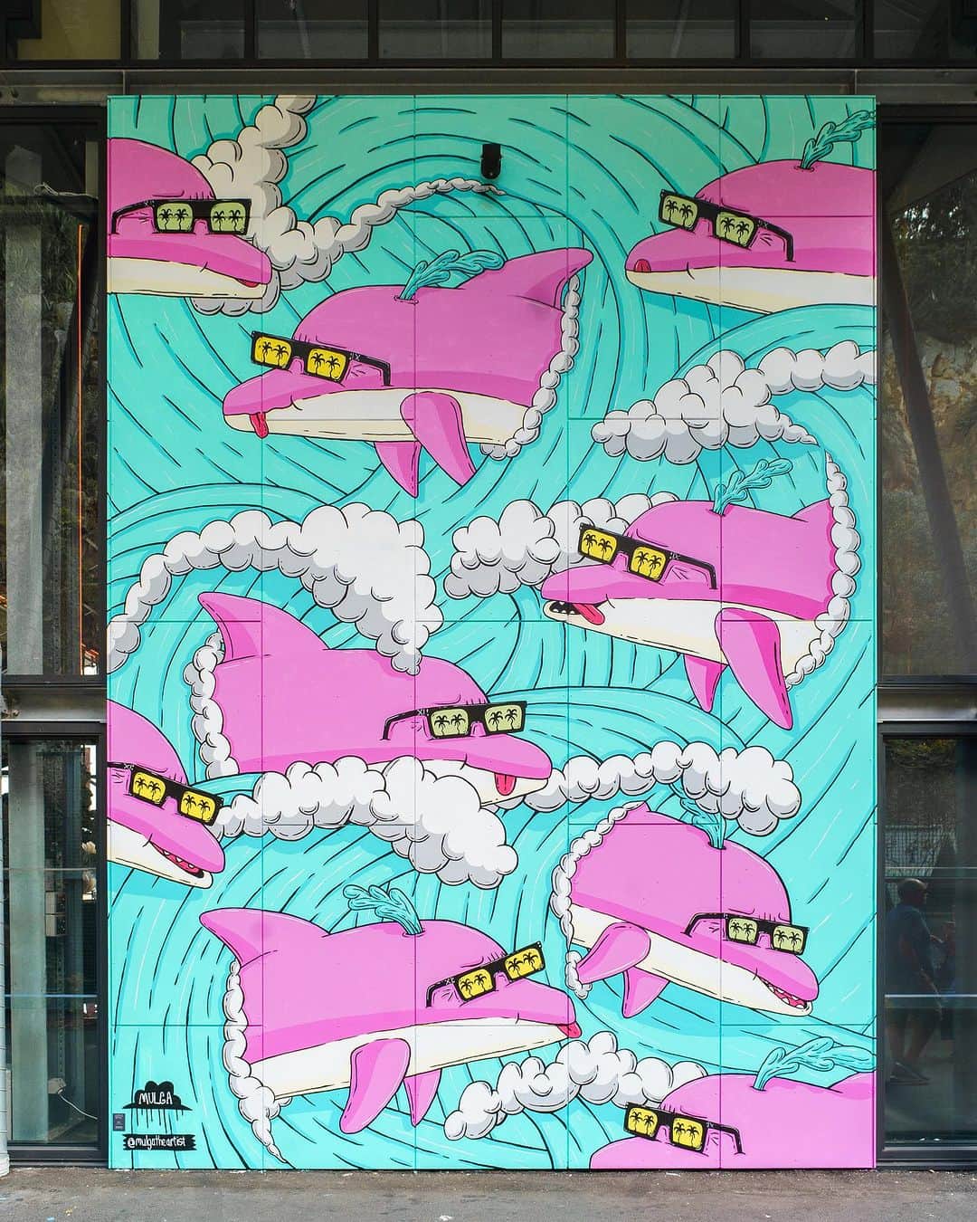 MULGAさんのインスタグラム写真 - (MULGAInstagram)「#BSAF2023 Artist @mulgatheartist is known for his unique Australian creations and signature style of intricate line work and bright colours 💥  Mulga’s summer-inspired designs bring to life a world where tropical bearded men run rampant and gorillas rule the world like some kind of funky planet of the apes 🦧🌴  The story of The Pacific Porpoise Crew 📖  Once, there was a pod of pink porpoises called the Pacific Porpoise Crew. They cruised around the Pacific, having heaps good adventures and sometimes even rescuing humans in need of rescuing.  Like this one time, a dude crashed his boat into a humongous humpback whale, and his boat was smashed to smithereens. The dude was left floating around in the Pacific like a pimply piece of plastic.  Luckily, the Pacific Porpoise Crew saw him and gave him a ride back to shore. They probably saved his life because he didn't even have an EPIRB (Emergency Position Indicating Radio Beacon). That's how much of a silly billy he was. Sheesh some people hey.  The End.  This mural can be found at 📍 Felons Barrel Hall, 5 Boundary Street, Brisbane City  📸 @soggybreadissad @stephenfinkel   #bsafest #BrisbaneStreetArt @felonsbarrelhall @howardsmithwharves @resenecolour @monarchpainting」6月30日 11時57分 - mulgatheartist