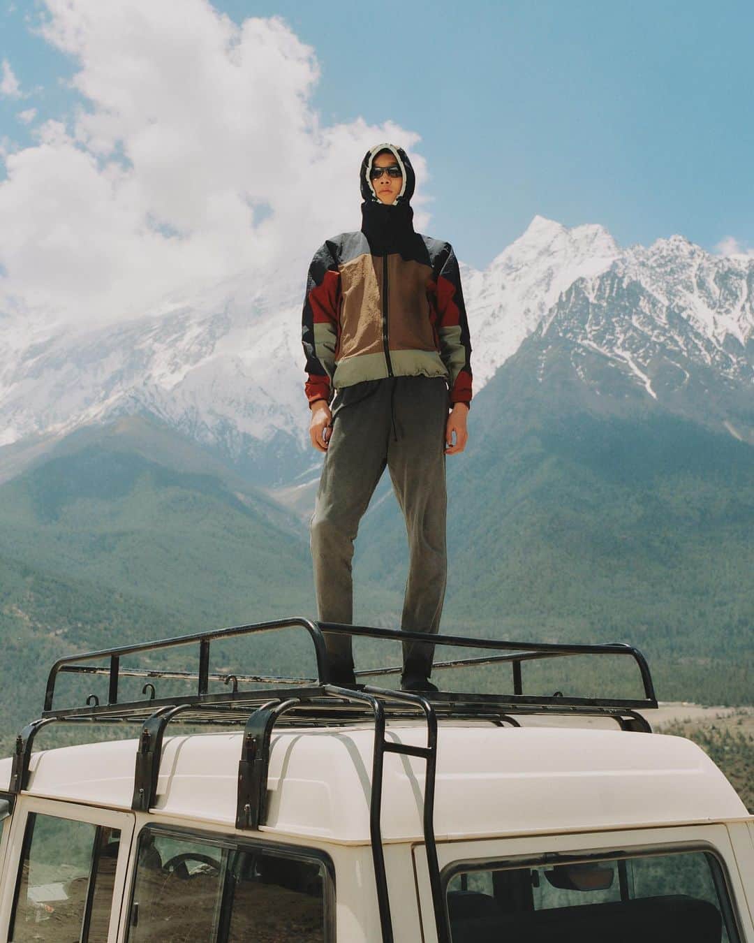 ジョン エリオットのインスタグラム：「“Scenes From Nepal” - “The Himalayas”  Explore the third lookbook through the link in our bio and stories, highlighted by product from the next drops, starting this Sunday, July 2nd.   Photography: @p.lo Models: @nizar_qlf_ , @benji.xu Lighting + Assist: @robertmholland」