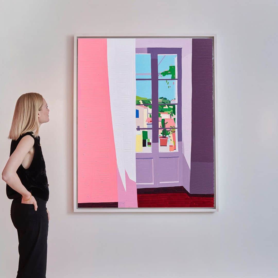 クリスティーズのインスタグラム：「Bompard Interior (2021) is a superb example of Guy Yanai's colourful fusions of everyday life, art history and memory.⠀ ⠀ Bright sunlight illuminates the interior of a room overlooking the French Riviera—the same scene that inspired artists such as Henri Matisse and Paul Signac. A cloudless and pleasant day extends beyond the pink curtain and through the closed French door.⠀ ⠀ Rendered in the artist's characteristic pixel-like brushwork and saturated pastel colours, the work sits at a threshold between the digital age and traditional painting.⠀ ⠀ Guy Yanai (B. 1977), Bompard Interior (2021). Estimate: £15,000 – £20,000.⠀ ⠀ 📍 First Open: Post-War and Contemporary Art Online: 21 June – 5 July.⠀ ⠀ #GuyYanai #FirstOpen」