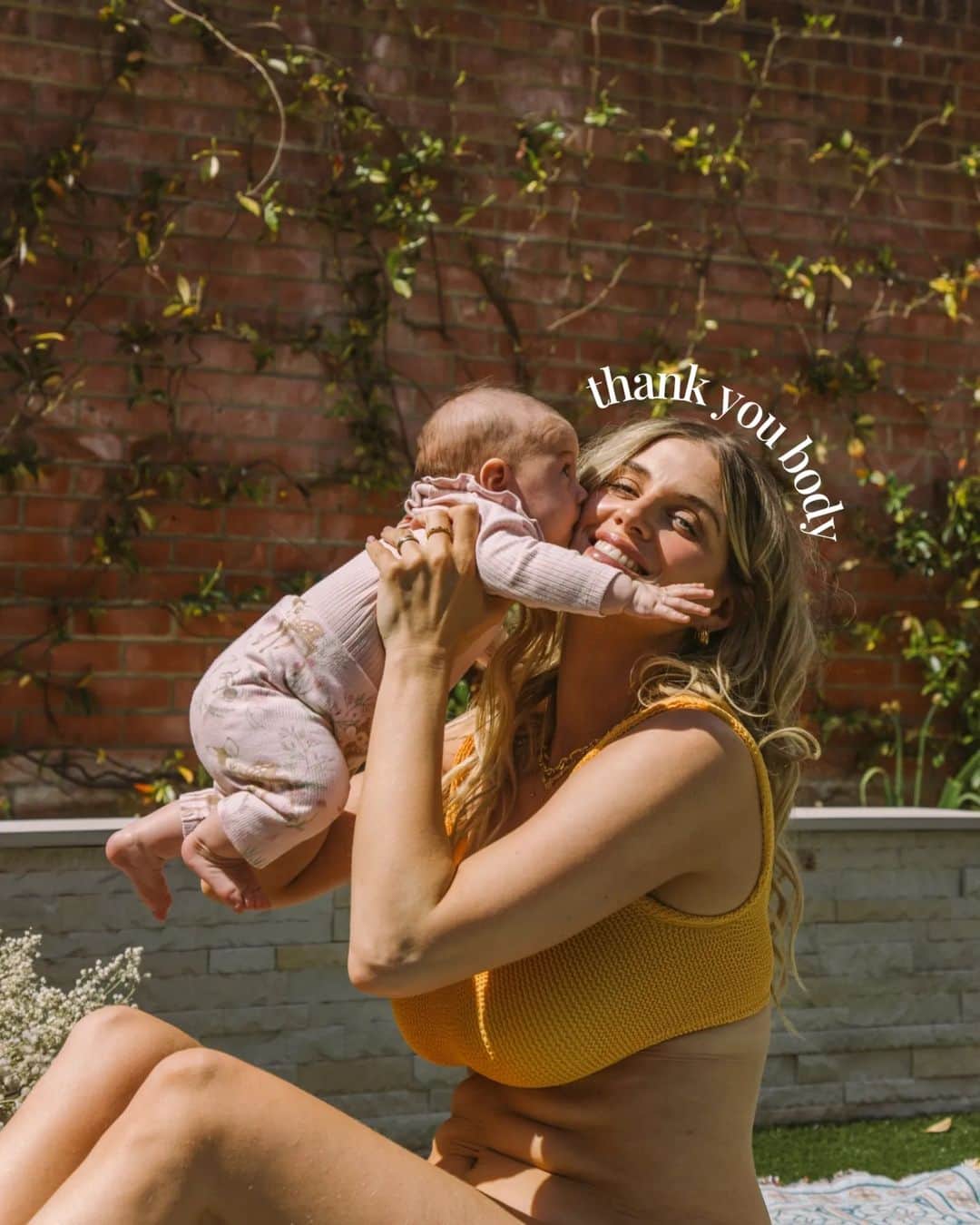 Ashley Jamesさんのインスタグラム写真 - (Ashley JamesInstagram)「The sun came out unexpectedly this afternoon so I hunted out a bikini and enjoyed some time in the garden.  I read this week that a new mum in the pubkic eye vowed not to wear a bikini after having a baby until she had her body back. It made me feel really sad for her and for all of us that that's how we're made to feel in society.  Our body has done this epic and miraculous thing that is literally essential for humanity continuing and yet we're made to feel ashamed of it.   It’s funny because in terms of how society views bodies, my body isn’t like it was before. Of course it isn’t, I’ve birthed two babies in the last 2 1/2 years. But I’m a lot more confident than I ever was. 💪  I used to think if I was just a bit thinner, or when I had hair removal or when I had abs or when I had a tan - then I’d be confident. It was always WHEN. And I never achieved when.   I remember going on holiday in my 20s and feeling like my body wasn’t good enough to wear a bikini.. I’d worry about shaving marks and ingrown hairs. And cellulite. And the stretch marks. I’d worry about the hair on my belly. About the roll on my belly (spoiler alert: It was skin. A skin fold.) I’d sit amongst a group of friends and look at their bodies and think how lucky they were as I sat with a towel covering myself.   But nobody was zooming in on my body like I was.   I didn’t eat pasta for almost a decade. I mean, I bloody love pasta.   I used to google how to be confident. I felt like I’d never find love until I was perfect.   I look at that same body from my 20s now and think how amazing I looked. How I wish I knew it. But also, how it didn’t define me. Ironically I was also a lingerie model back then.   Where did I learn to hate myself so much? From comments made around me by adults when I was young, from descriptions of women's bodies in magazines ...   Mostly I’ve learned that I don’t need to love my body to wear clothes. I’m neutral about it - I am grateful for it for everything it allows me to do. i don’t care what people think of it. I’m not an object.  And if I had my old body, then I wouldn’t have my babies. So I think that is reason enough to appreciate it and to wear the bikini. 🌞🫶💛」7月2日 5時10分 - ashleylouisejames