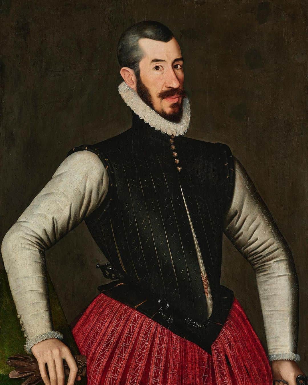 のインスタグラム：「The talented artist Gillis Claeissens only re-emerged from obscurity in the past decade.⠀ ⠀ This elegant portrait of an unknown man, who probably belonged to the nobility of the Habsburg Empire, wears a white silk buttoned doublet, a slashed yellow-lined black jerkin and a raspberry red upper hose embellished with trimmings.⠀ ⠀ The painting is an excellent example of the artist's meticulous rendering of the fine details in his sitters' costumes. Other features typical for the artist include the square fingers outlined in black, the translucent irises illuminated by an oblique light and the folds on the ruffs and cuffs.⠀ ⠀ Gillis Claeissens (1526-1605) ‘Portrait of a gentleman, three-quarter-length, in red breeches and a black jacket, holding a pair of gloves'. Estimate: £40,000-£60,000. ⠀ 📍Old Masters Part II: 7 July | London.⠀ ⠀ #OldMasters #Portrait #PortraitMode #Portraiture #ClassicWeek」