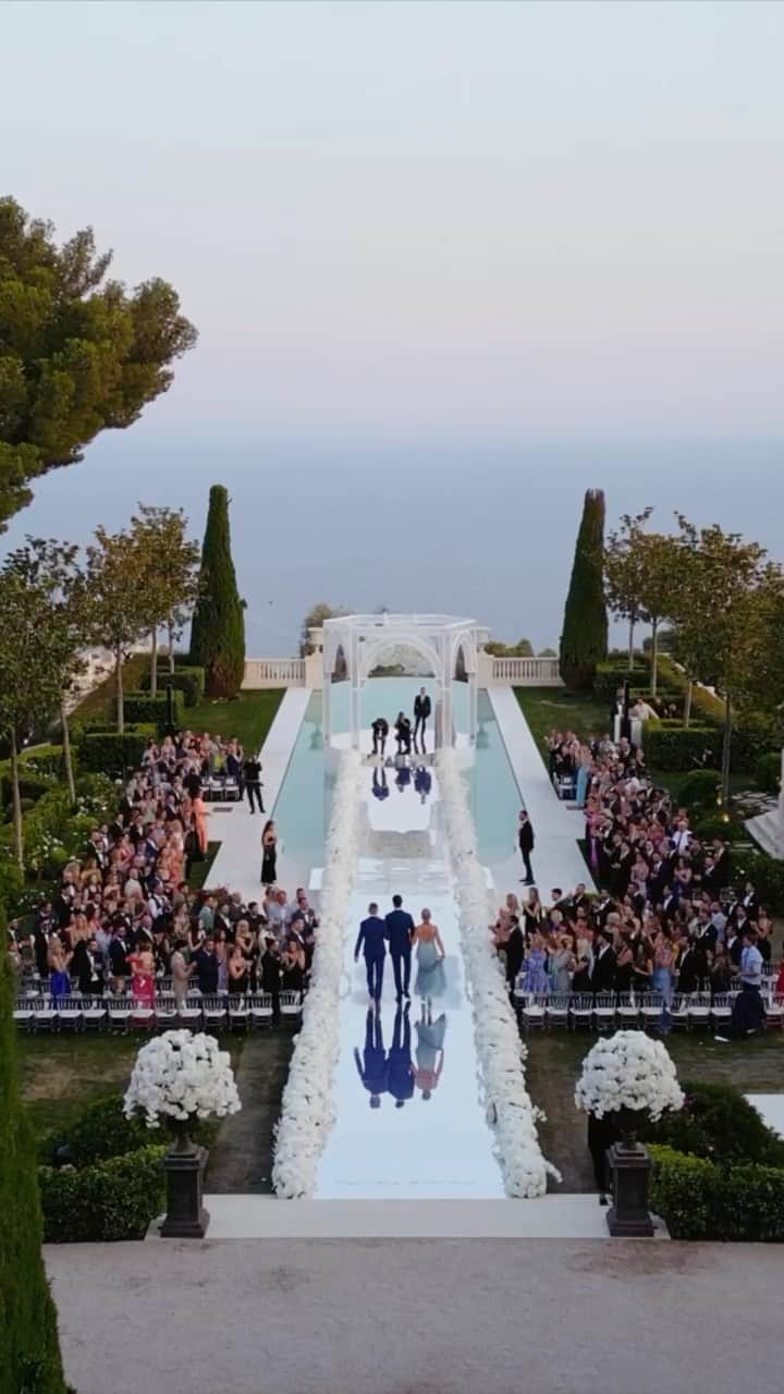 ティボ・クルトゥワのインスタグラム：「The day I married my best friend was an absolute dream come true! 🥹💙  It was the happiest day of my life, surrounded by our loved ones as we celebrated our love. From the moment we first met, to the beautiful ceremony, to the incredible dinner and after party, everything felt like a fairytale.   I am still in awe of how stunning my wife looked in her gorgeous white dress. You truly are the love of my life, and I am so excited for all the wonderful moments we have ahead of us.   I love you, my best friend! 💙 @mishelgerzig  Video by @aleksey_malev  Best production team @sky_production  Design @shani.natalie_eventdesign @tuscanyflowers  Suit @dolcegabbana  Dresses @may_mashiah  Hair & make up @ran_karisi @elle.adida  Jewelry @joyeriasuarez DJ’s @djitaygalo @martingarrix @valentinoignoto」