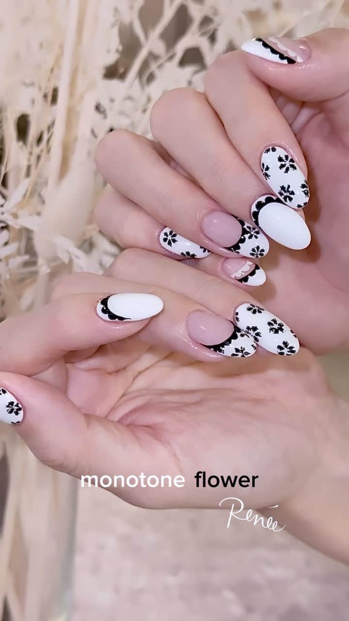 埜藤理恵のインスタグラム：「お客様のワンピース柄リピート もしゃもしゃな黒の花がかわいい 前回のストーン無しバージョン🤍🖤  All @dnagel_spacenail  □ Rie Nofujiプロデュース @tree01official エプロン 好評発売中  □ Renée professional brush シリーズ ＊オーバル ＊トップフレンチ ＊スマートフラット Renée web shop 全国ネイルディーラーにて発売中 プロフィールURLより飛べます  □ 店舗詳細 ⇩ 大阪府大阪市北区堂山町1-2 R&Eビル3階 am10:00〜pm20:00 JR大阪駅から徒歩7分 阪急梅田駅から徒歩7分 御堂筋梅田駅から徒歩7分  ご予約は サロンの公式LINEより受け付けております。 @rrieenee プロフィールURLより LINE飛べます。 LINEにて行き方動画も配信しておりますので ご参考くださいませ」