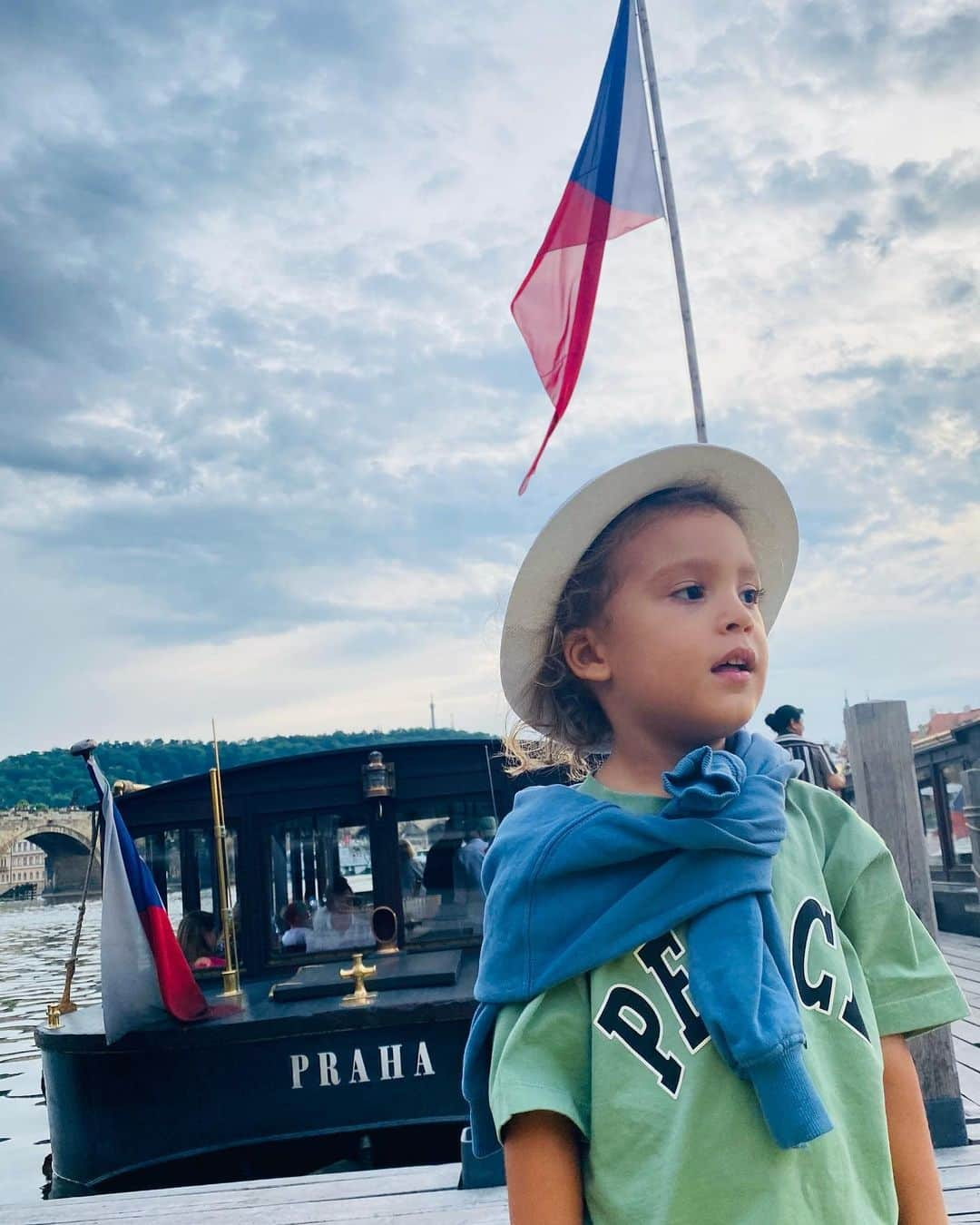 ペトラ・ネムコバさんのインスタグラム写真 - (ペトラ・ネムコバInstagram)「The Bridges 🌉 💫 🌌  These postcard-like images of Bodhi in Prague evoke a strong sense of joy and honor as I reflect on the grandeur of Charles Bridge and Prague. It was a remarkable experience to share this moment with Bodhi for the first time, where our footsteps echoed the rich history of Prague, our homeland, the Czech Republic.   Did you know that according to tales passed down through generations, the positioning of this majestic bridge is believed to align with celestial and astrological forces? Legends speak of its connections to solstices, equinoxes, and even specific constellations, infusing the bridge with an otherworldly energy. 🌗🌠  As the Supermoon graces the sky today on July 3rd and the Sirius Gateway begins on July 4th, let us connect with the highest frequencies of this Supermoon and Sirius, our spiritual sun.   Let's embrace the harmony between the celestial and the earthly, just like Charles Bridge, and become the bridges we need for our collective PEACE now and in the future. 💫  Have a blessed week, Fullmoon Supermoon & Sirius Gateway. ✨🌕 ⭐️   #CharlesBridge #Czechia 🇨🇿 #Supermoon #FullMoon #ProudHeritage  💚 Bodhi’s sustainable fashion outfit by @molo」7月3日 21時45分 - pnemcova