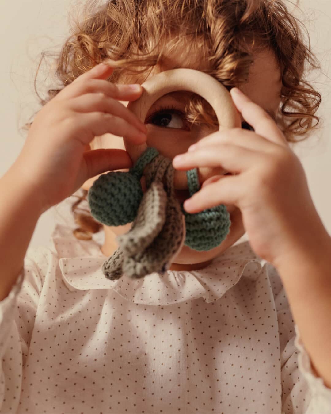 bonpointのインスタグラム：「Bonpoint Newborn | Curious spirit. ​ Our handmade cherry rattle was made for your little one's roaming mind. Easy to hold for the smallest hands. ​  📷 @Denis.Boulze  #Bonpoint #Newborn #BabyGift」