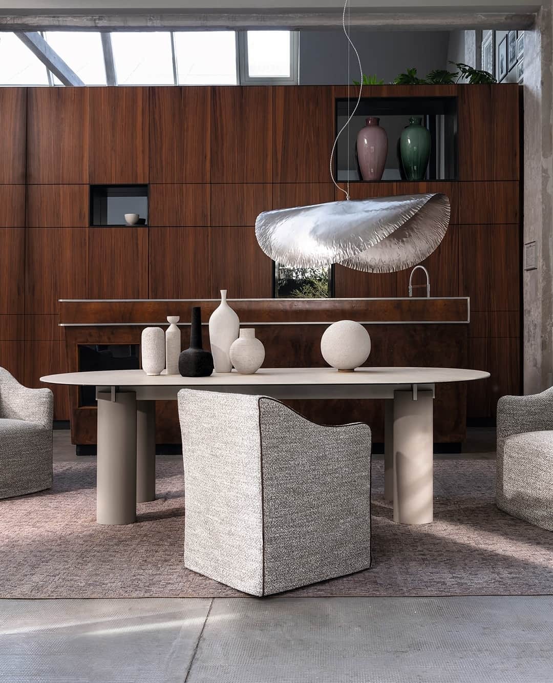 のインスタグラム：「SAIA Collection / Dining room with a bourgeois classic style⁠ ⁠  A bourgeois-styled lounge, where clichés from the past find their place in a contemporary context.⁠ The Saia chairs and the Daen table come together to create an aesthetic rooted in glass, marble, steel, and stoneware, illuminated by the lunar reflection of the Silver suspension lamp. ⁠ ⁠ A dining room set up with exquisite details and attention to materiality. ⁠ ⁠Styling @ilariabacciocchi⁠ Photo @maxrommel⁠ ⁠ #gervasoni1882 #homestyling #minimalism #interiordesign #diningroomdecor #diningroomdesign」