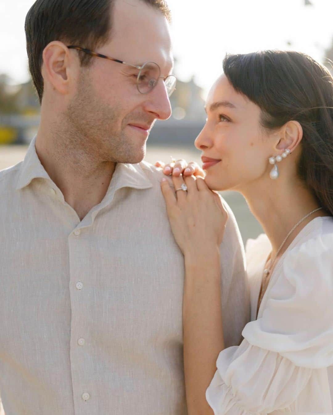 ルマ・グローテさんのインスタグラム写真 - (ルマ・グローテInstagram)「I had to keep pinching myself to be sure that this magical evening celebrating our engagement with our families, was real.. and every time I looked to the side and saw Dan smiling, I couldn’t help but giggle. It’s crazy to be this smitten!  In the words of Gabriel Garcia marques: it’s enough for me to be sure that you and I exist at this moment. @dhturtel   Jewelry by @themayjewelry  Dress by @reformation  Photos @holtz_photography」7月4日 4時07分 - thelumagrothe