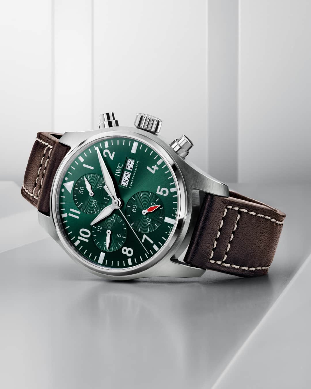 IWCのインスタグラム：「The perfect companion.  The dial layout with various counters not only emphasises the distinctive instrument look; but also the mechanical stopwatch function. Available options are calfskin or rubber straps in various colours, and a high-quality stainless steel bracelet with fine adjustment clasp.   #IWCpilot | #TheReference   🔗Link in Bio  ℹ  Green dial Stainless steel case 41mm EasX-CHANGE system IWC-manufactured 69385 Calibre Ref. IW388103」