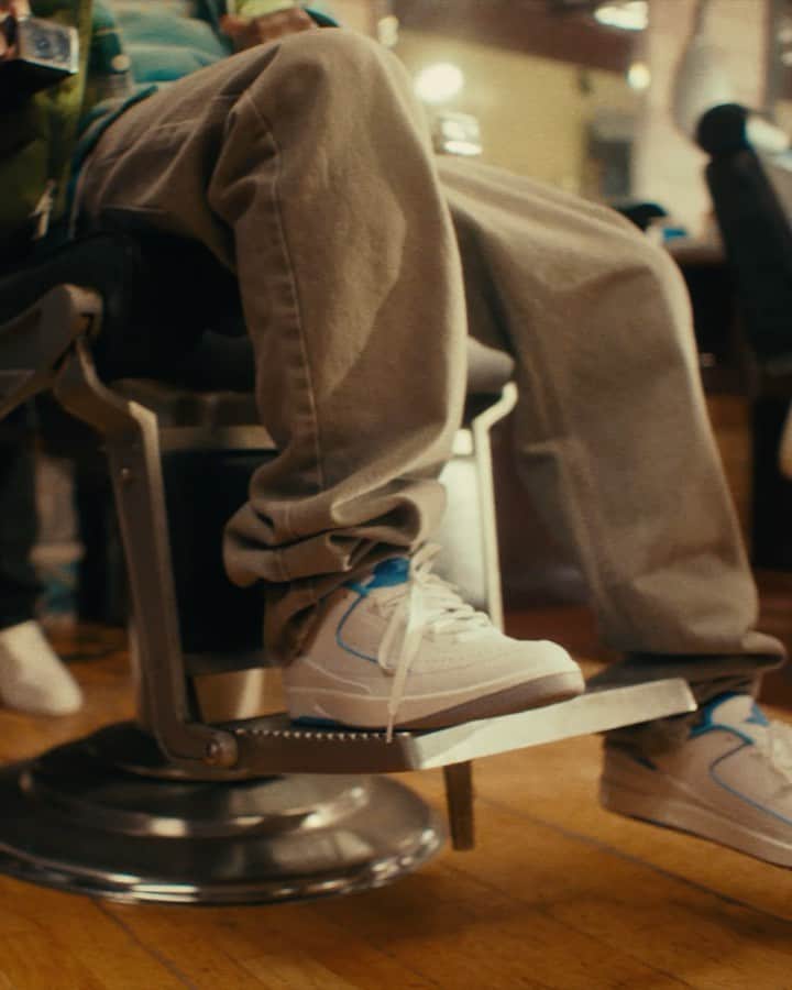Jordanのインスタグラム：「OG Harlem panache meets a timeless classic. The one and only @bloodyosiris keeps his style sharp at the barbershop, wearing the new Air Jordan 2 Low ‘University Blue.’   Dropping on 7/8 at select US retailers and on the SNKRS app outside the US.」