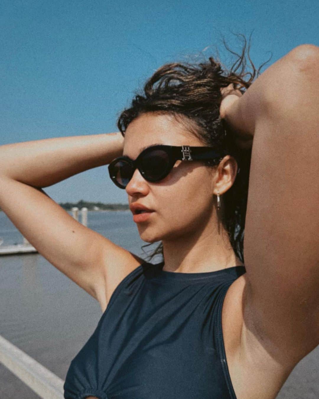 Tommy Hilfigerのインスタグラム：「@madisonbaileybabe takes on summer in our cropped sporty bikini.」