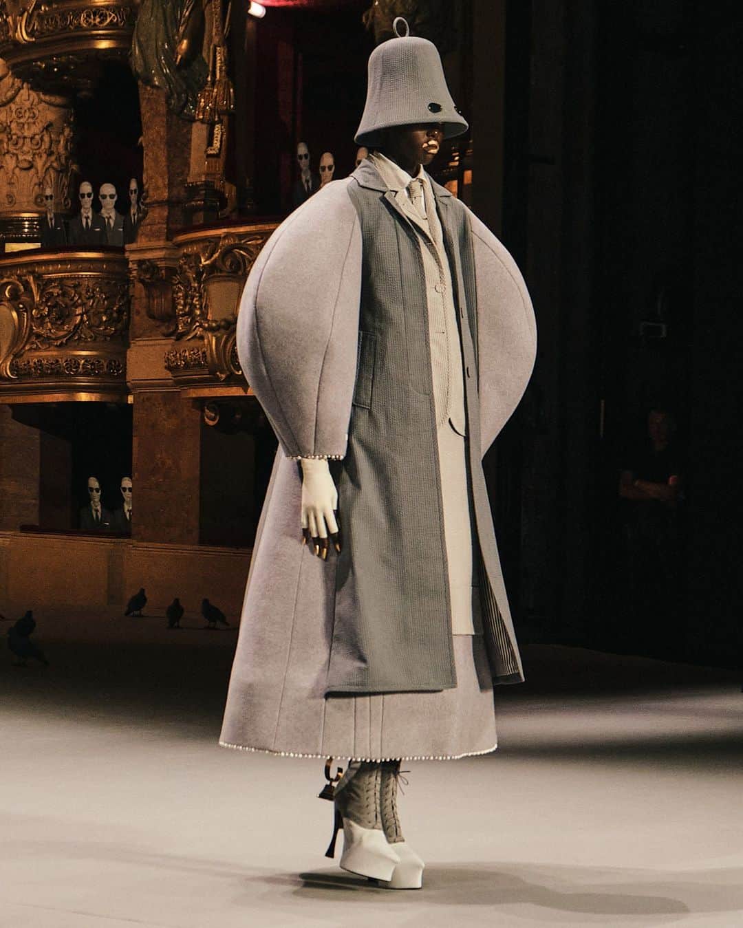 New York Times Fashionさんのインスタグラム写真 - (New York Times FashionInstagram)「At couture shows in Paris this week, Thom Browne centered the gray suit, while Schiaparelli, Dior and Iris Van Herpen spun their own dreamy tales through clothing.  The shows began in the shadow of national unrest over the police killing of a teenager of Algerian and Moroccan descent that has sparked charges of racism and discrimination. For a while, there was a question about whether the collections would — or should — happen at all. That tension raised the bar for the shows that went on, writes The New York Times’s chief fashion critic, @vvfriedman, including Maria Grazia Chiuri’s @dior show and the @irisvanherpen show based on Oceanix, the floating city being planned for South Korea.  On Monday, @thombrowne made his couture debut. He effectively proposed that the gray suit deserved the same mythic status as the Chanel bouclé suit or the YSL Smoking or the Dior Bar. The show was an argument that American fashion deserves its place on the couture stage.  At @schiaparelli, Daniel Roseberry provided an exegesis on the virtue of dialogue: between art and fashion, past and present. It was one of his most relaxed, considered collections in seasons: black collars swirling around the shoulders of perfectly cut white coats; plush opera puffers and suits covered in mirrored mosaics.  Read the full review at the link in our bio. Photos by @simbarashecha; Sarah Meyssonnier/Reuters; Gio Staiano」7月6日 2時56分 - nytstyle