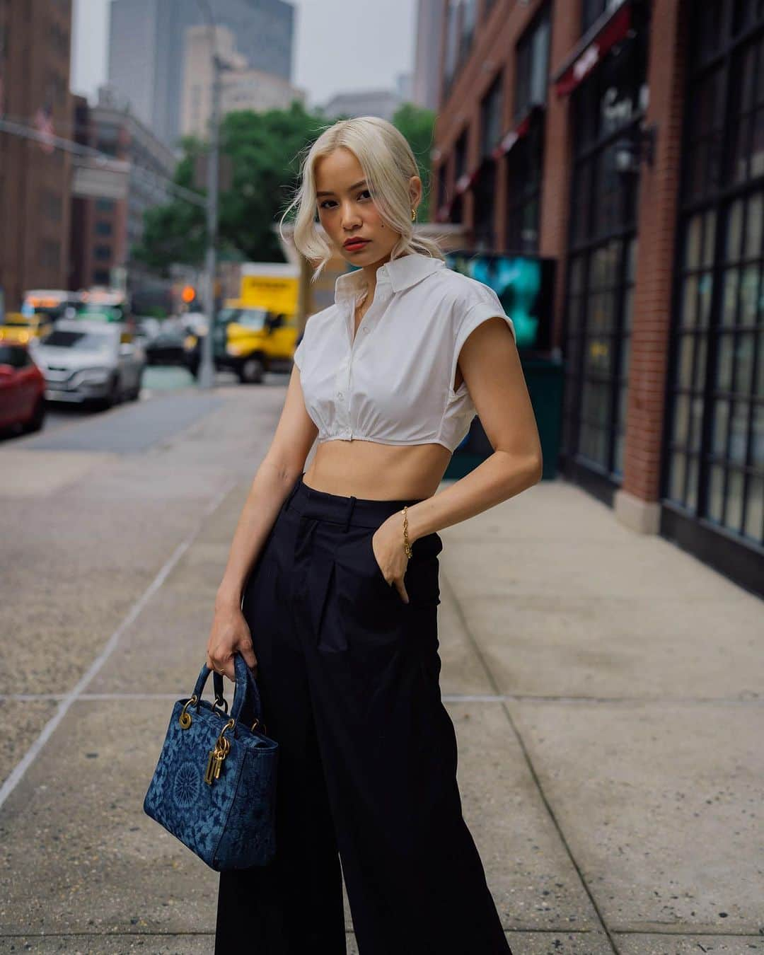 Yukiのインスタグラム：「City living ♥️   Outfit details:  Top @lacademie_ @revolve  Pants @commense.official  Purse @dior @luxedujour  Shoes: @rayethelabel via Revolve   #dioraddict #denimbag #nyfashion #nyc #nycblogger #nyfashionblogger #nycblogger #revolve #revolveme」