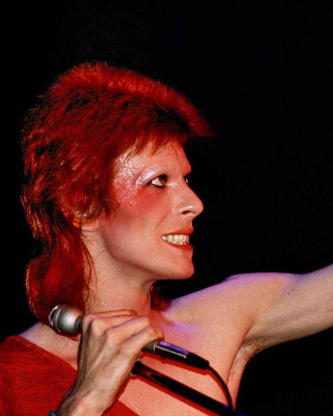 デヴィッド・ボウイのインスタグラム：「REMINDER: ZIGGY FILM IN USA, CANADA AND MEXICO  “President Joe once had a dream...” *  After reaching number 2 in the UK Box Office this week, the Ziggy Stardust film will screen in the USA, Canada and Mexico on 9th and 10th July.  Digitally remastered for the 50th anniversary, the film looks and sounds better than it’s ever done, and it now includes Jeff Beck’s astonishing performance too.   Find your local movie theater at www.DavidBowie.com/ziggy and relive the historic night on the big screen. (Linktree in bio)  * You just never know, he might show up.   📸 Mick Rock  #Ziggy50 #BowieHammersmithOdeon50th #ZiggyMoPi」