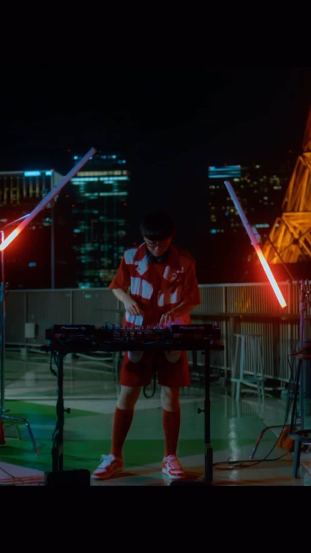 のインスタグラム：「🗼OUT NOW🗼  SO-SO - Red Mix (House DJ Set) Full Ver. is on YouTube! Please check out my channel👍  【"Red Mix"  Video Credit】 Director, Camera Operator: Kazumi Watanabe (@k319w ) Lighting Director: Mikisuke Umeda Production: CAMARADE  Styling: Soichiro Kobayashi (@soichiro.kobayashi) Jacket, Pants: biscuithead( @__biscuithead ) Socks, Sneaker: A BATHING APE® (@bape_japan )」