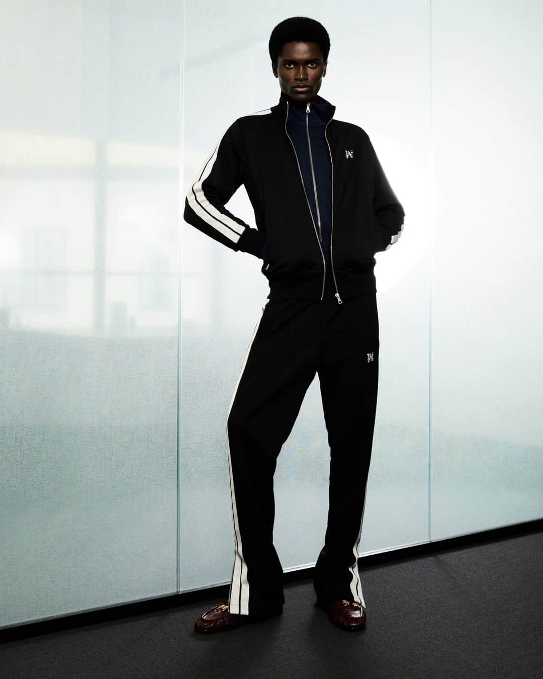 パーム・エンジェルスのインスタグラム：「THE MONOGRAM  Beyond classic, the tracksuit elevates its values, adding the soft touch of leather to its essential lines and featuring a distinctive embroidered Monogram.  #PAMonogram #Fall23」