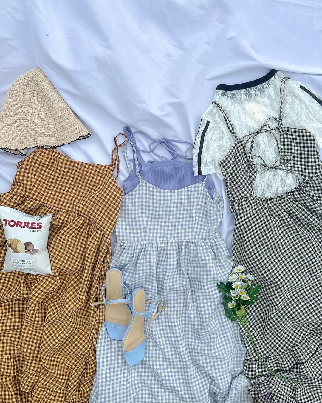 w closetのインスタグラム：「【pick up item】  "これ欲しいと思ったら保存しておくと便利♪" _______________  フリルティアードキャミワンピース \ special price / ¥6,930→¥4,950 color : オフ/ブルー　ブラック/エクリュ　ブルー/ピンク　ブラウンチェック  後ろリボンが可愛いチェックのキャミワンピース 裾に向かって広がるシルエットで女性らしいシルエットに♪  肩紐で長さの調節可能なのも嬉しい♡ _______________  #wcloset#ダブルクローゼット#wclo_snap#リゾートコーデ#新作コーデ#夏トレンド#夏スタイル#サマーコーデ#トレンドアイテム#カラーコーディネート#スタイルアップコーデ#カラーアイテム#夏コーディネート#レイヤード#ワンピース #ワンピースコーデ#キャミワンピ#キャミワンピース#キャミワンピコーデ#チェックワンピ#チェックワンピース #ギンガムチェック#ギンガムチェック柄#ギンガムチェックワンピース #フリルワンピース #ティアードワンピース #ティアード#夏ワンピ#夏ワンピース#レーストップス」