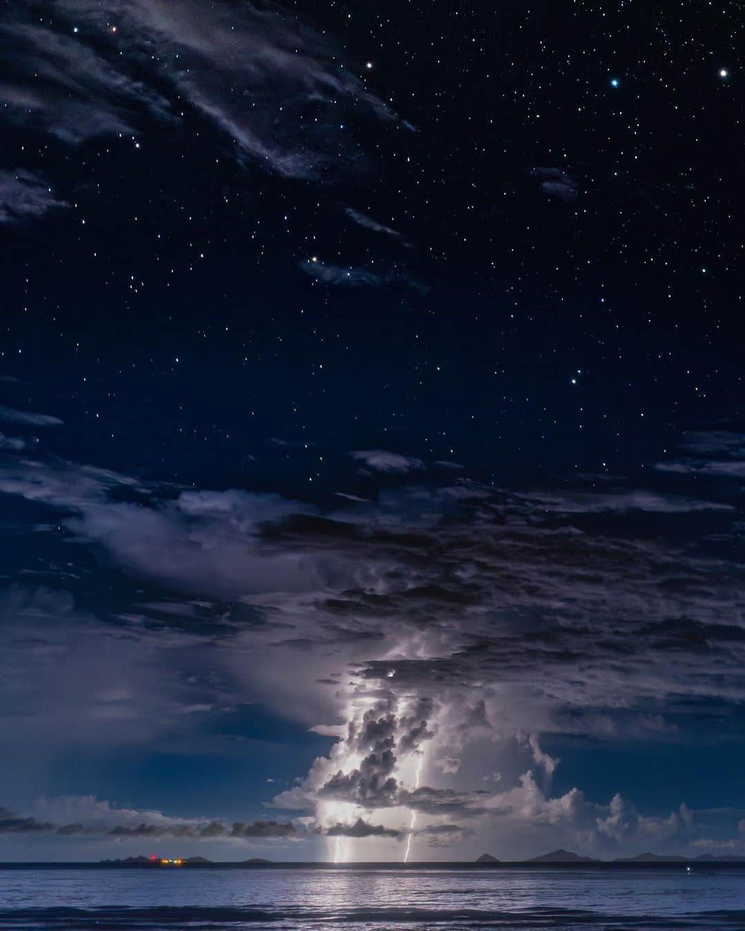 Syuuichi Yamadaさんのインスタグラム写真 - (Syuuichi YamadaInstagram)「📸 @yama_ok5  満天の星空から落ちる稲妻⚡️ 夏の大きな入道雲が出てた夕方 日が暮れたあと入道雲から出る雷を見つけ ISO200で設定して雷狙いで撮った星空🌌 久しぶりに興奮しながら シャッター切って撮った1枚 撮影日23.07.10 📷 Nikon Z7II 14-24/2.8S @nikonjp  📍 Kunigami Vil Okinawa Japan #沖縄#沖縄旅行#星空#ヤンバル#天の川 #오키나와#稲妻#visitokinawa#okinawa#lightning#milkyway #JTAokinawa#nature#visitjapanjp#light_nikon @jta_okinawa @natgeotravel @natgeo @visitjapanjp @visitokinawajapan @nature  @beautifuldestinations」7月11日 19時50分 - yama_ok5