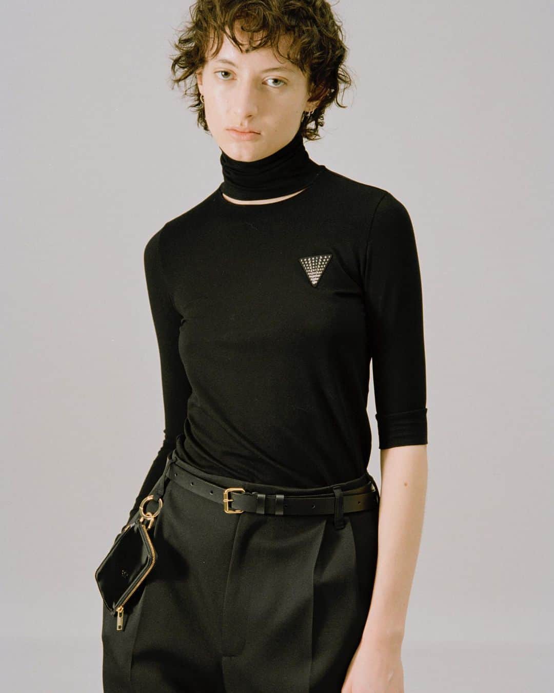 TARO HORIUCHIのインスタグラム：「#tarohoriuchi 2023 S/S ‘EXTRAORDINARY MOMENTS’  ・ Item: Slashed Turtletop Color: black Size: 1  Model height: 177cm ・ Now available at th products sendagaya,  official EC store & selected retailers. Discover our latest arrivals in stores and at thproductsonline.com ・ スラッシュドタートルトップ/ 起毛感の少ないレーヨンを用いたベア天竺素材で、落ち感が特徴。毛玉ができにくい抗ピリング性のある素材。 ・ #tarohoriuchi23ss  thproductsonline.com」