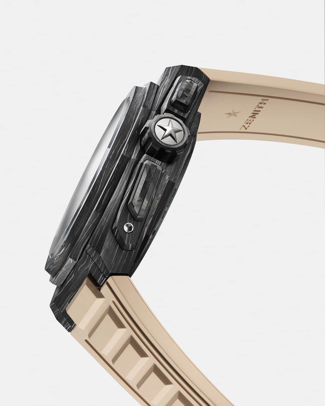 ゼニスのインスタグラム：「#DefyExtreme: Made with Extreme E: The world's lightest automatic high-frequency 1/100th of a second chronograph, forged from carbon fiber. DEFY Extreme E edition.」
