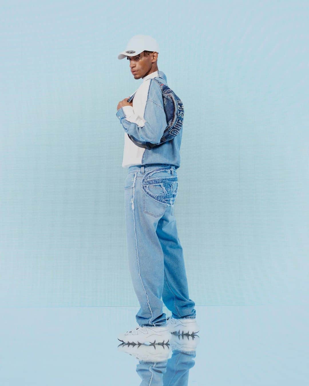 ディーゼルのインスタグラム：「Better from behind.    Feel light and free this summer in our lightweight Oval D embroidered denim pants and mini skirt. Made from super stone washed, lightweight denim with a raw edge finish, it features the Oval D logo in a patchwork embroidery across the backside.    Tap to shop and discover more at the link in bio.   #ForSuccessfulLiving」