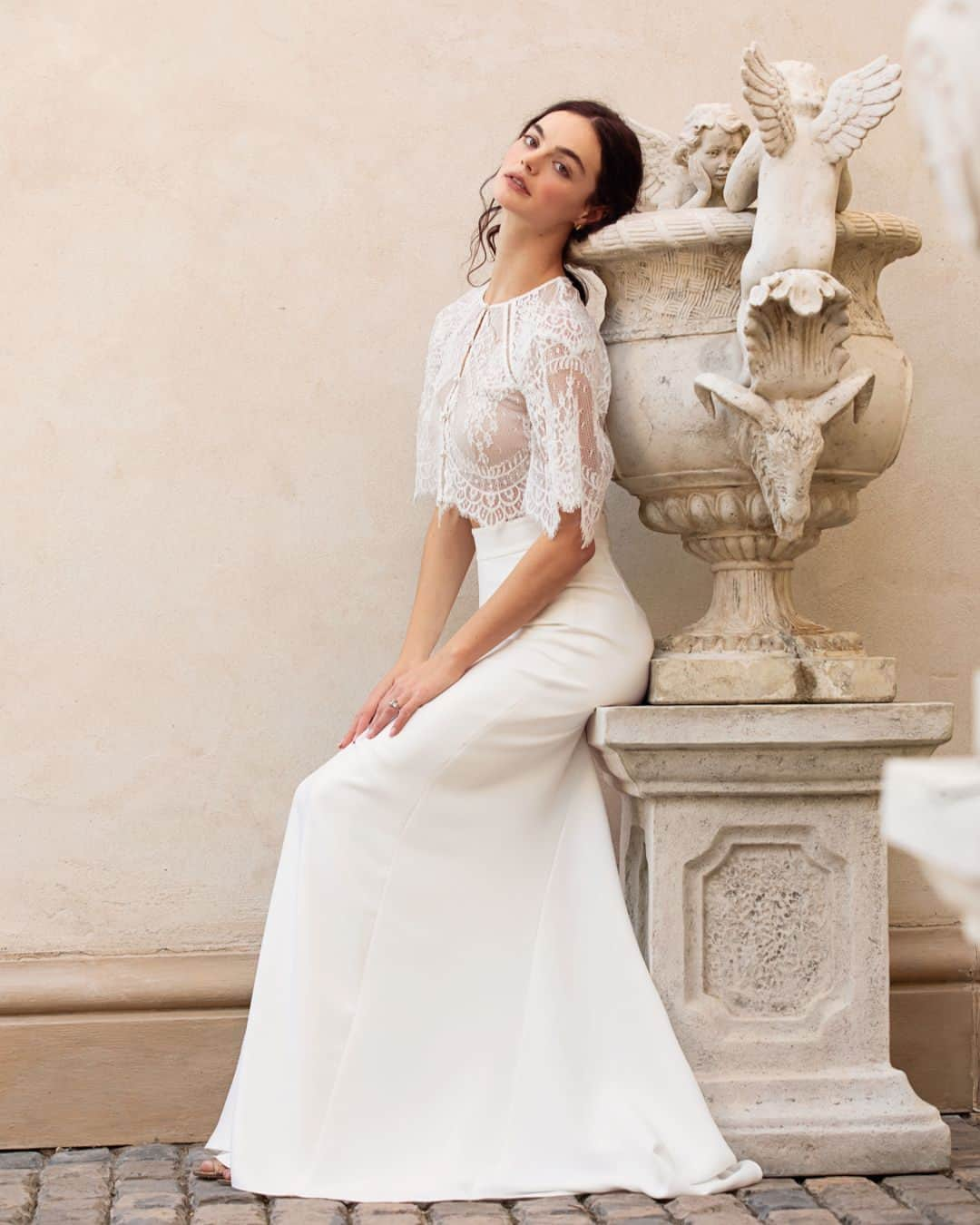 キャサリンディーンのインスタグラム：「NEW TO OUR FAVOURITES ~ TALLI SKIRT ​​​​​​​​​  Made from a buttery ivory crêpe, the fitted, floor-length Talli skirt is the ideal addition to your wedding day ensemble. The crêpe godet inset at the back adds volume and movement to this high-waisted skirt, making it perfect for dancing the night away.   #catherinedeane #bridalsale #onlinebridal #weddinggowns #weddingdresses #bridalseparates」