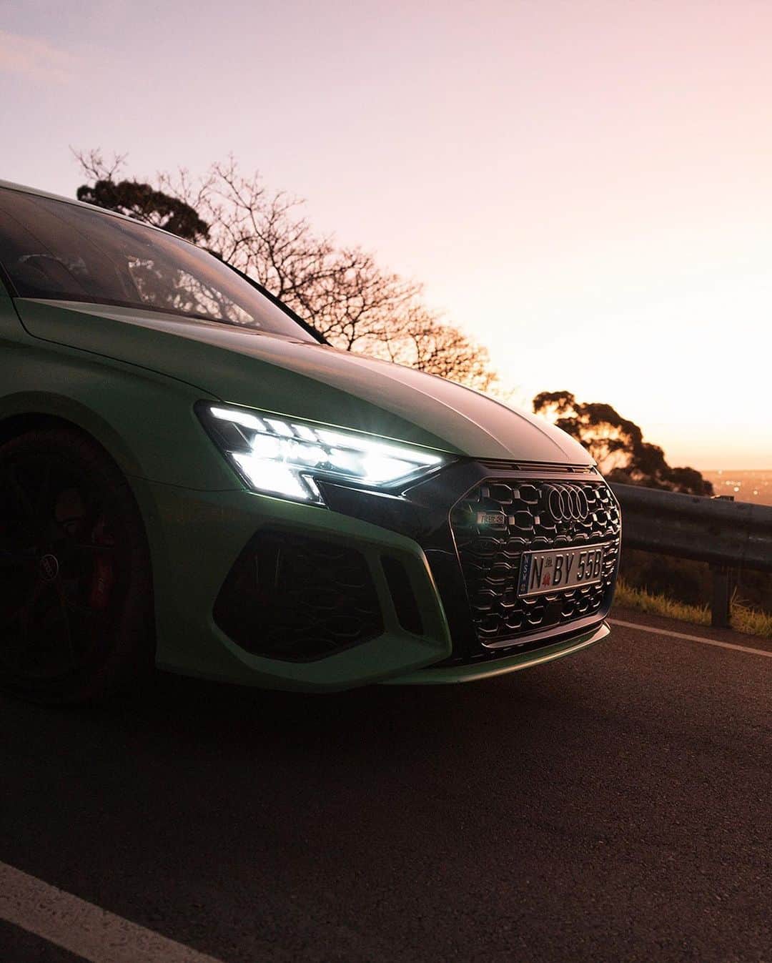アウディ ジャパンのインスタグラム：「圧倒的なパフォーマンスを発揮し、夕陽に照らされたワインディングロードを走るAudi RS 3 Sportback。   4WDシステムquattro®に搭載されたRSトルクスプリッターが俊敏なコーナリングを実現する。     *写真は欧州仕様車です。日本仕様とは異なります。   #AudiRS3Sportback   #Audi #アウディ #AudiJapan #アウディジャパン #RS3 #AudiRS3 #アウディRS3 #AudiSport #Sportscar #スポーツカー #AudiLife #Audigram #CarLife #CarLifeStyle #GermanCars #Car #Cars #Cargram #アウディのある生活 #アウディのある風景」