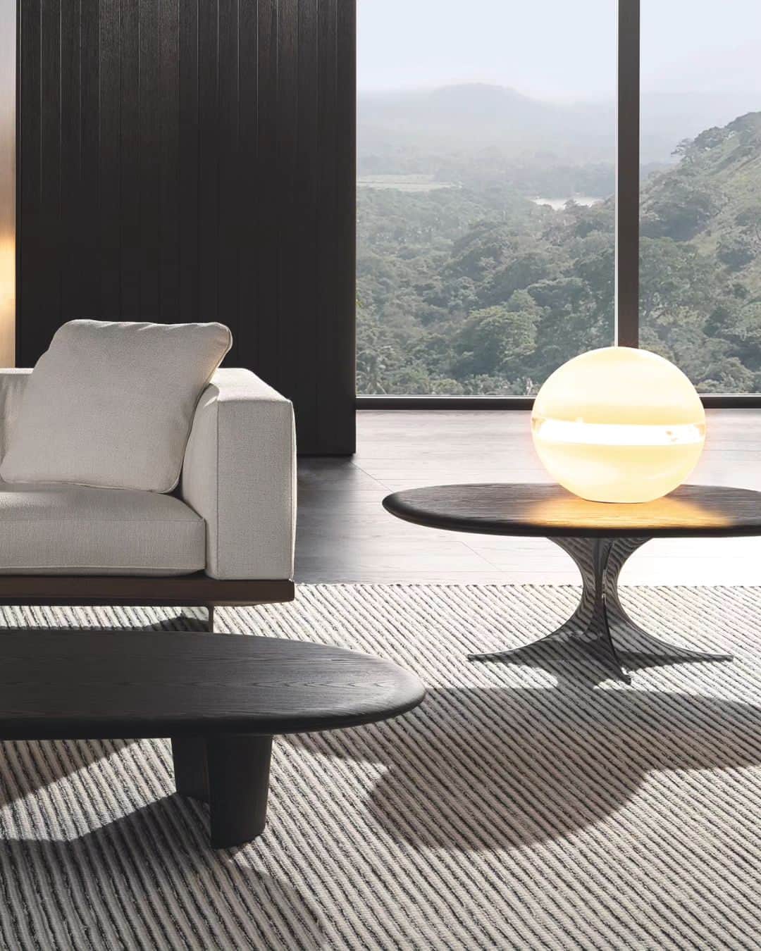 Minotti Londonさんのインスタグラム写真 - (Minotti LondonInstagram)「Anish Wood is the new version of the coffee table designed by @rodolfodordoni, now featuring new materials, shapes and dimensions.  The circular or elliptical Licorice coloured ash top has edges smoothed like a river pebble, the result of in-depth technological research, and rests on the characteristic polished chrome or Pewter metal base.  Tap the link in our bio to explore the Anish Wood coffee table.  #minotti #minottilondon #minottifurniture #minottiitalia #minotti2023collection #table #madeinitaly」7月14日 10時22分 - minottilondon
