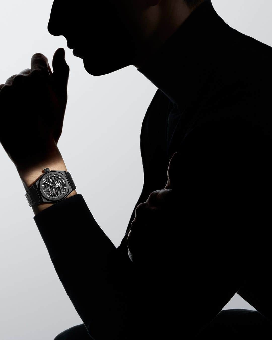 ゼニスのインスタグラム：「#DefySkyline: More than just a striking silhouette. The DEFY Skyline Skeleton in black ceramic features a symmetrical open dial revealing the skeletonized El Primero 3620 automatic high-frequency calibre with 1/10th of a second indicator.」
