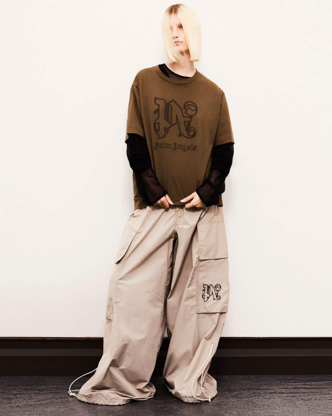 パーム・エンジェルスのインスタグラム：「THE MONOGRAM  Outerwear classics remastered by expanding volumes and emphasizing curved lines. A new perception of shapes and proportions, enhanced by a refined chromatic choice.  #PAMonogram #Fall23」