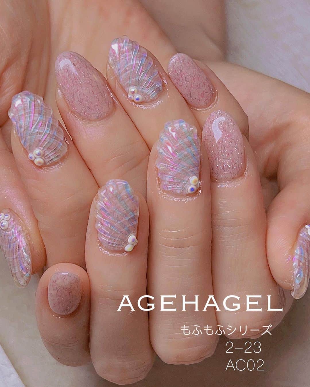 agehaのインスタグラム：「先日から発売中の #もふもふシリーズ  新作アートが大人気です♡ やっぱりめちゃくちゃ可愛い😍  ピンクの貝殻風アートですが、 もふもふシリーズが 良い仕事してるー♡  オーロラクリスタルパウダーが ビームの様に出るのも AC03ならではの光❤️  #もふもふしましょう #夏のもふもふ #もふもふの夏 #オーロラシェルアート」