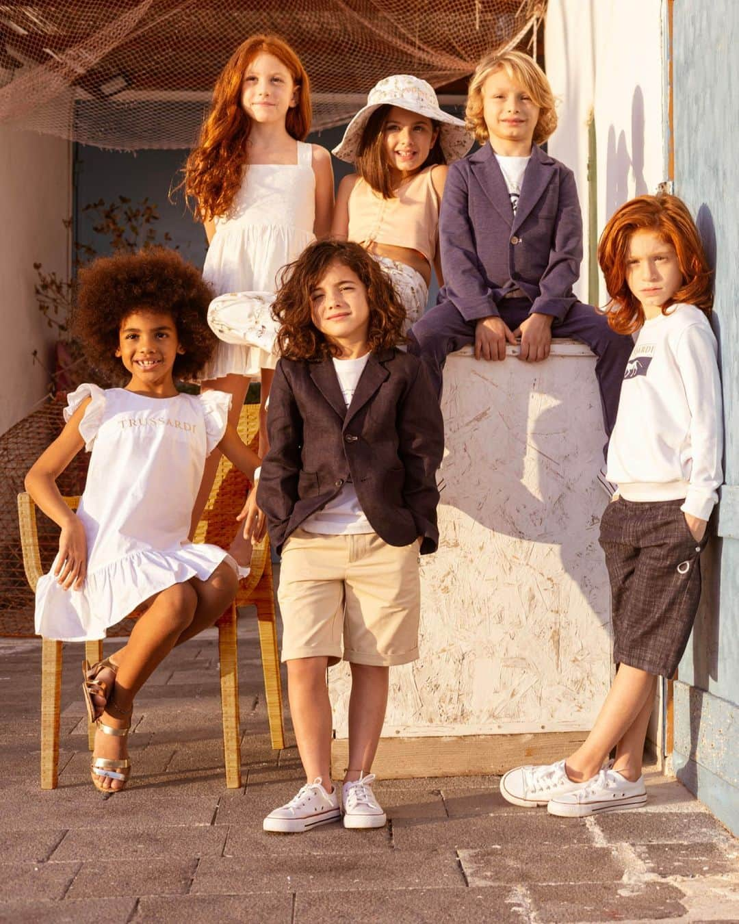 トラサルディのインスタグラム：「#TrussardiJunior Spring-Summer 2023 collection presents a playful and contemporary wardrobe for the quintessential Italian summer holiday.」