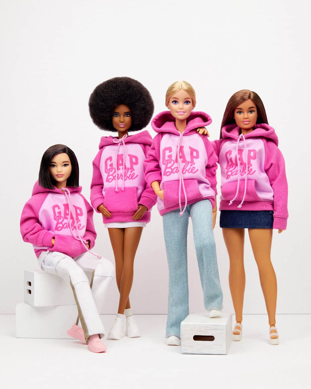 GAPのインスタグラム：「You *know* we had to get Barbie™️ in her own logo hoodie at some point during this collab. ✨  . We made a limited edition hoodie just for her — and the exclusive collectors box, too.」
