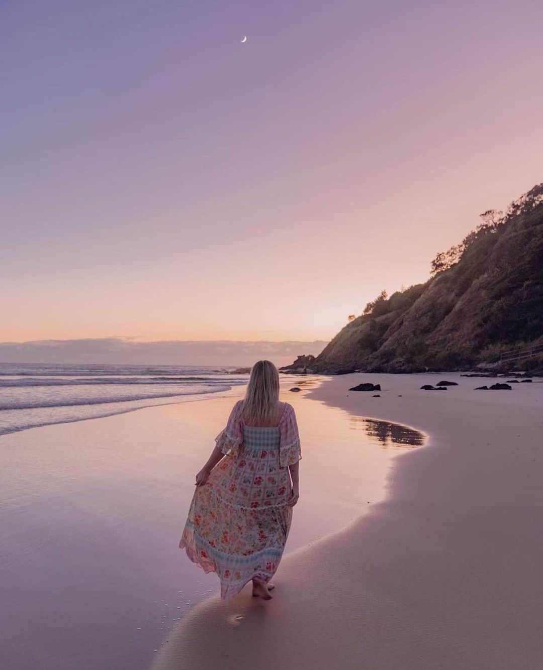 SPELLのインスタグラム：「Dancing with the moon 🌙 our angel @millymollymae in the bay in our Flora Gown at sunrise 🌅」