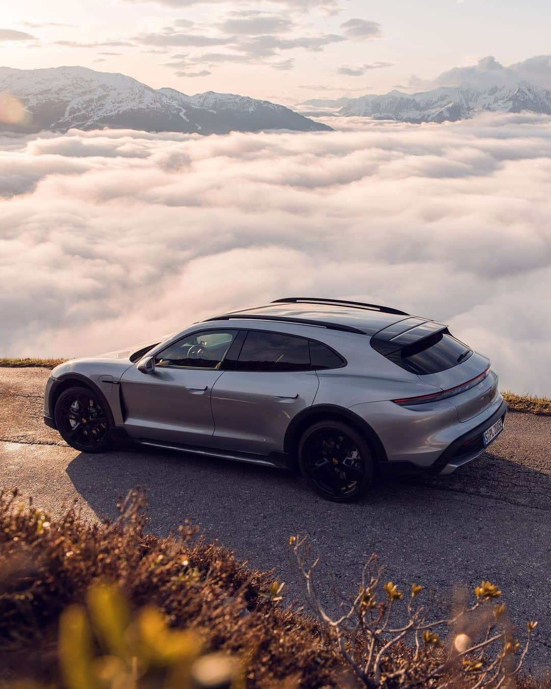 Porscheさんのインスタグラム写真 - (PorscheInstagram)「Every cloud has a silver Taycan lining. 📸 @tomklockerphoto __ Taycan 4S Cross Turismo: Electrical consumption combined in kWh/100 km:  24,8 - 21,4 (WLTP); Range combined in km:  415 - 488 (WLTP), Range City in km:  517 - 598 (WLTP); CO2 emissions combined in g/km: 0 (WLTP) I https://porsche.click/DAT-Leitfaden I Status: 07/2023」7月17日 18時54分 - porsche