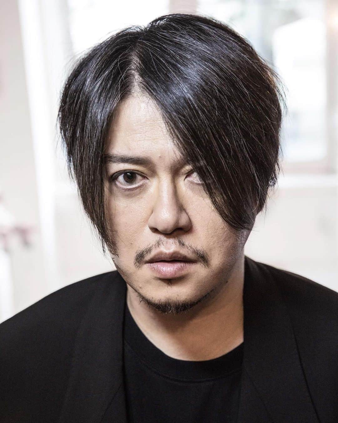 渋谷慶一郎のインスタグラム：「パリでミックジャガーやデヴィッドボウイ、ノエルギャラガーらを撮影していたClaude Gassianにポートレートを撮影してもらった。ちょうどアンドロイドオペラのシャトレ座公演の初演の前日、かなりピリついたゲネプロの直前に劇場で撮ってもらったのが印象深い。 I had a great opportunity of my new portrait by Claude Gassian, who photographed Mick Jagger, David Bowie, Noel Gallager and so many special artists in Paris. It was the day before the premiere of my Android Opera MIRROR, at Théâtre du Châtelet. I still remember it was a very tense moment just before the dress rehearsal.  Thank you @christophebrunquell for connecting us.  Photo by @claudegassianofficial」